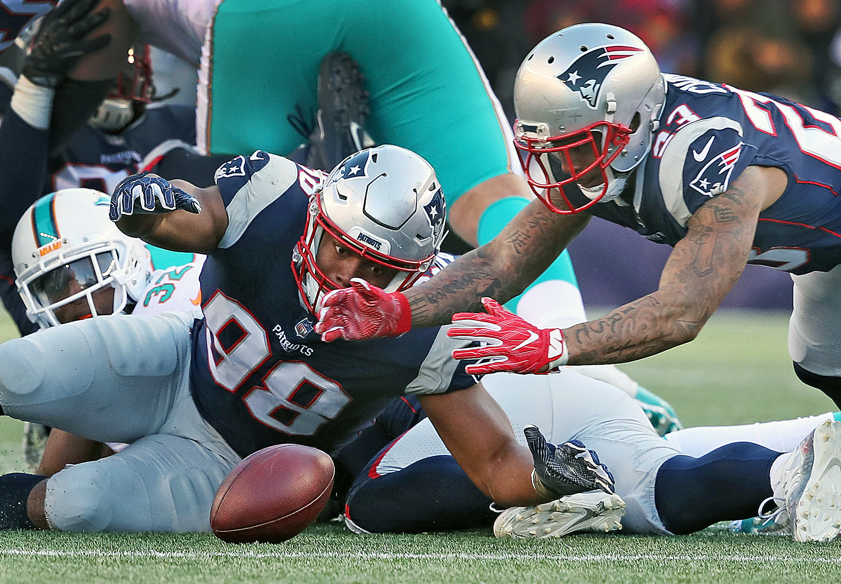In a November win over Miami, Trey Flowers (98) knocked the ball loose and Patrick Chung recovered the fumble.