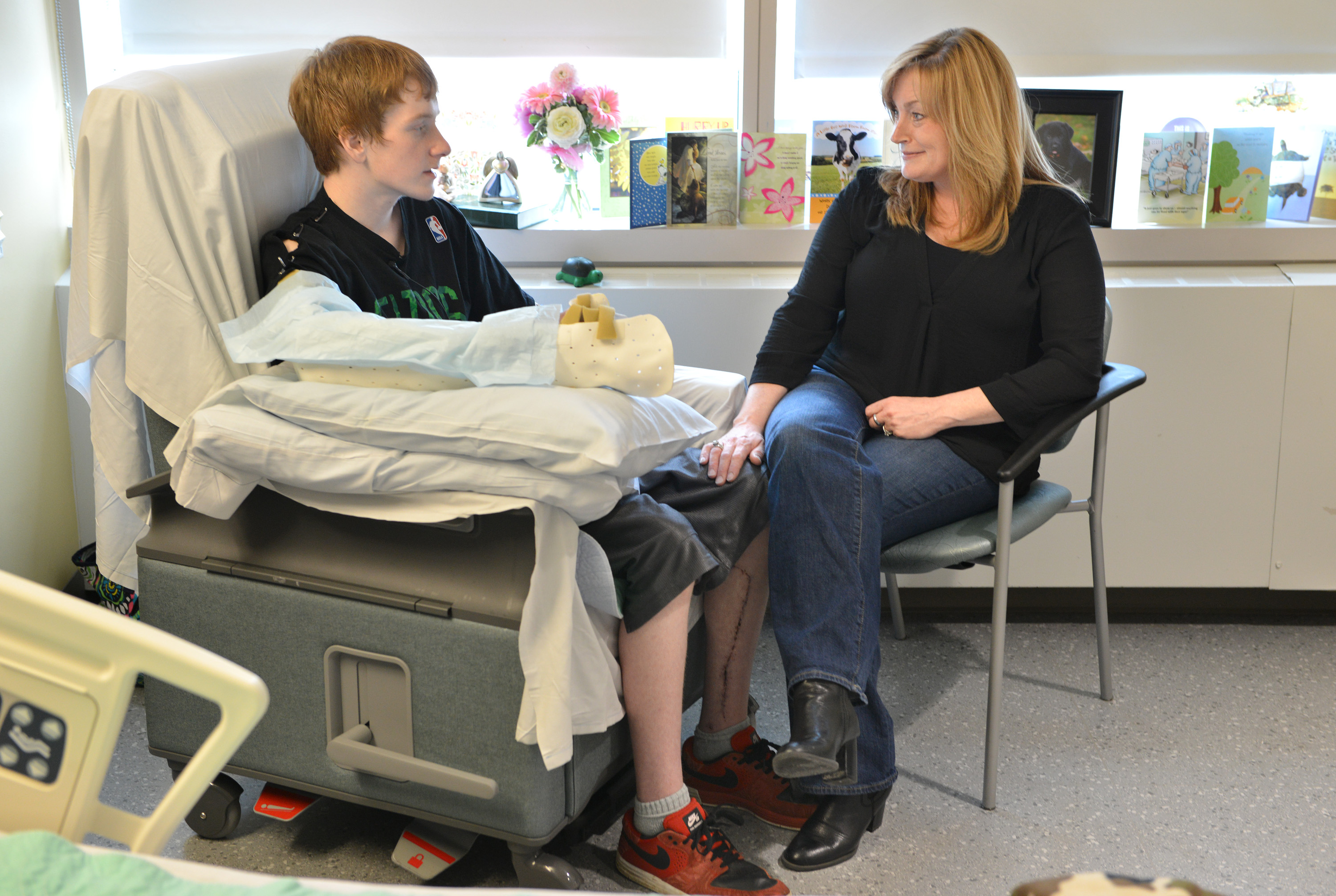 Brett Bouchard with his mother, Rebecca Martin, at Mass. General.