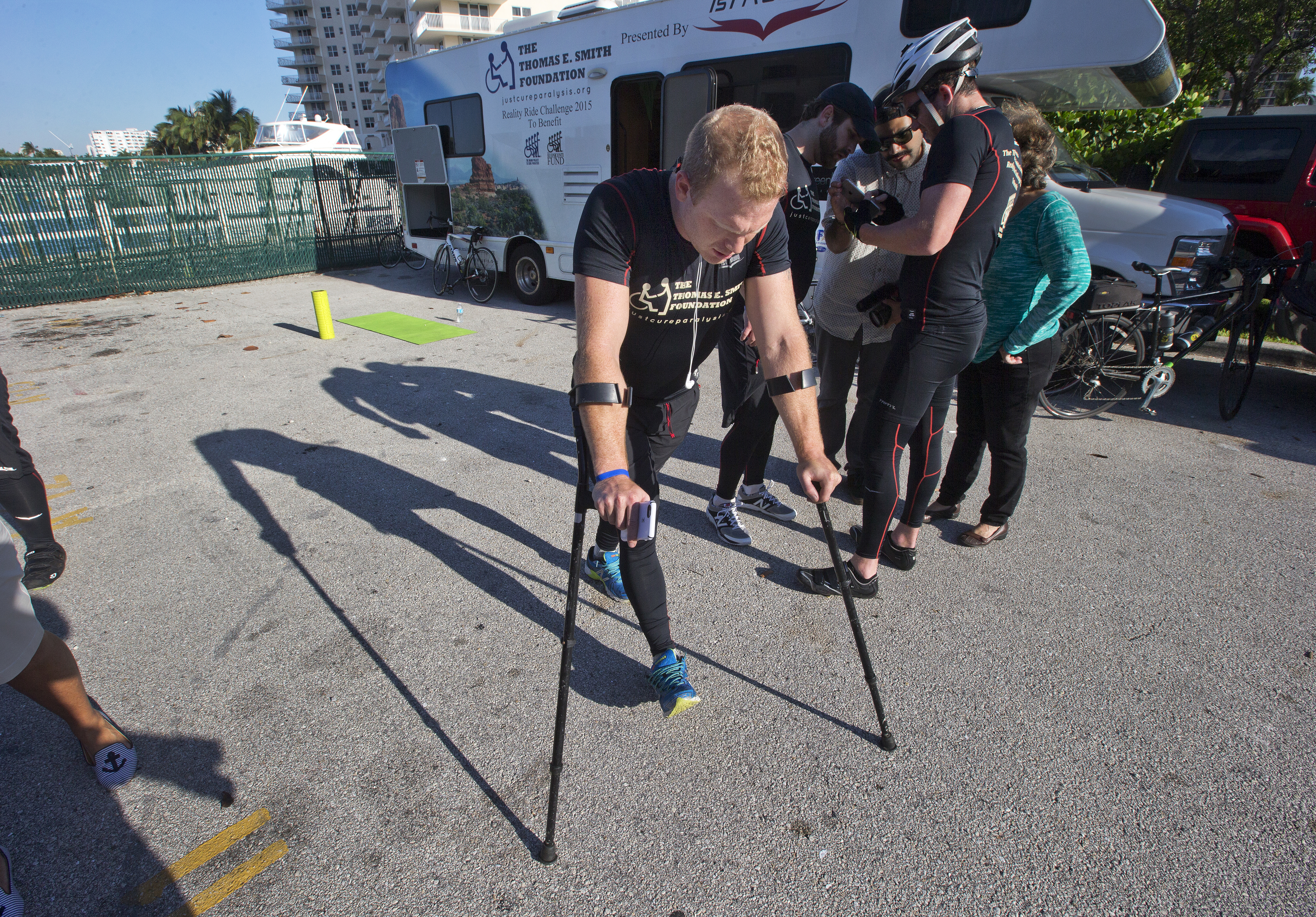 Tom Smith no longer needs a wheelchair and gets around with two canes.