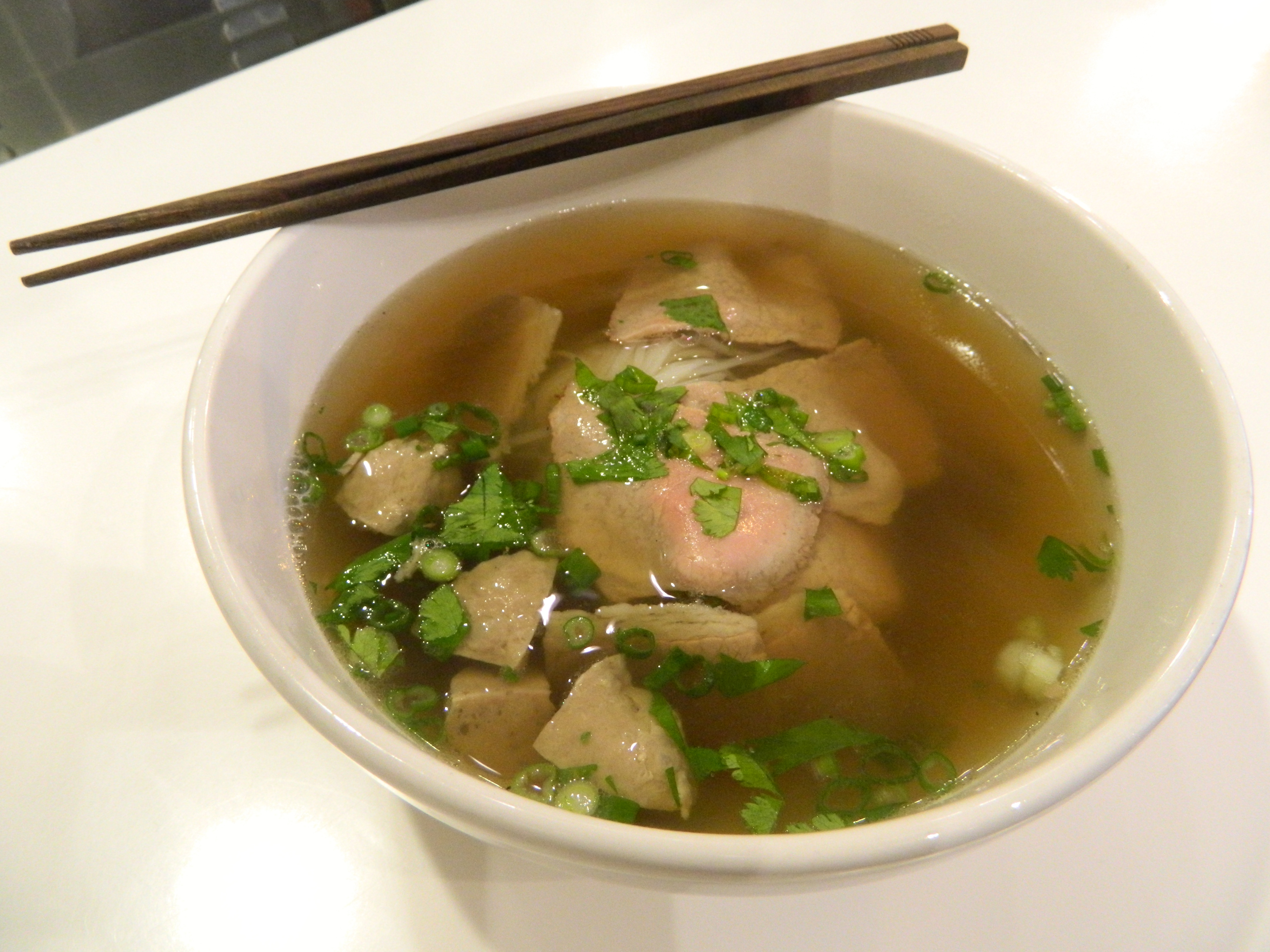 Among the dishes at Saigon Sisters is beef pho, featuring a rich broth filled with sliced beef flank and beef meatballs.