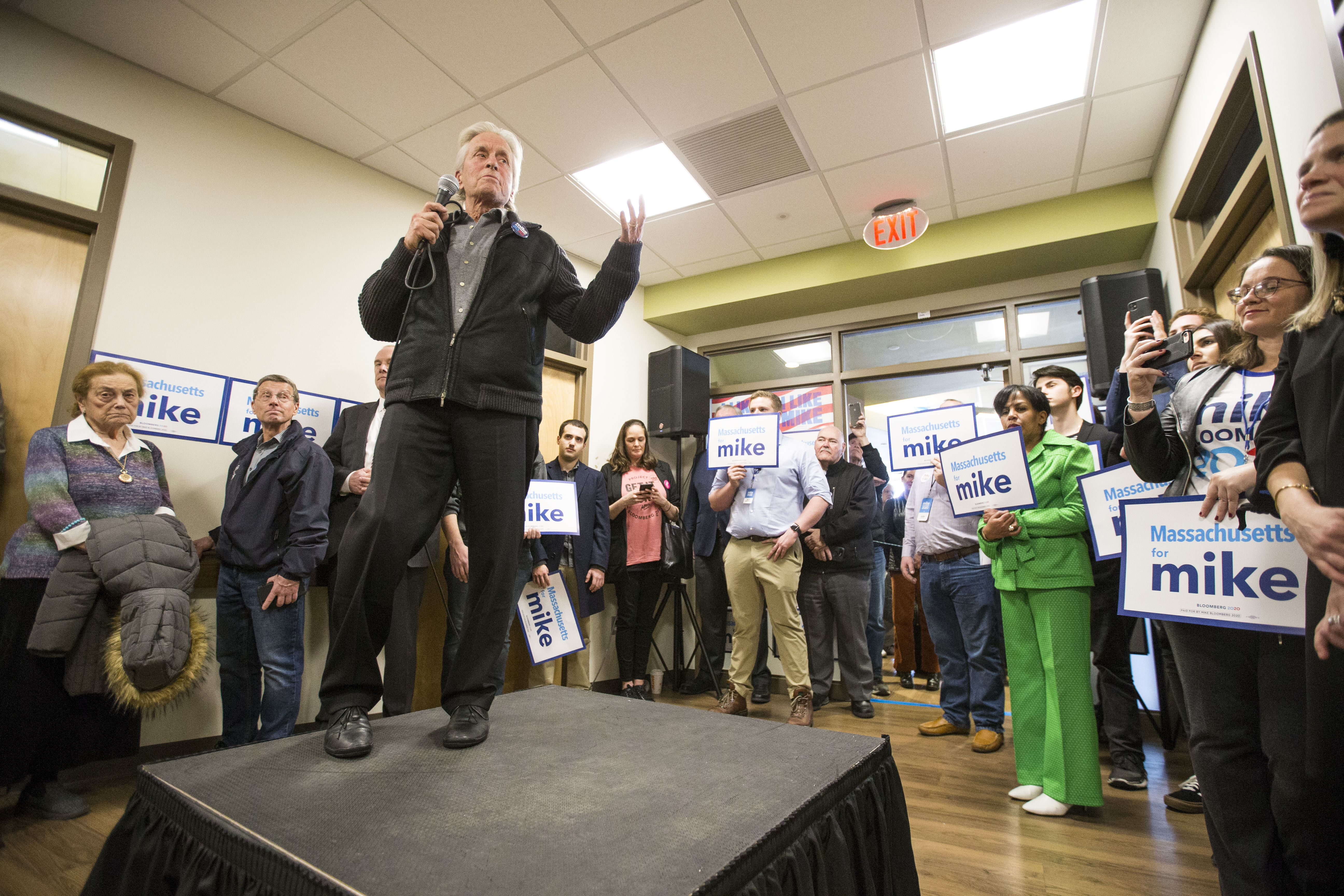 Actor Michael Douglas talked to the crowd during the opening of Michael Bloomberg's campaign office in Medford.