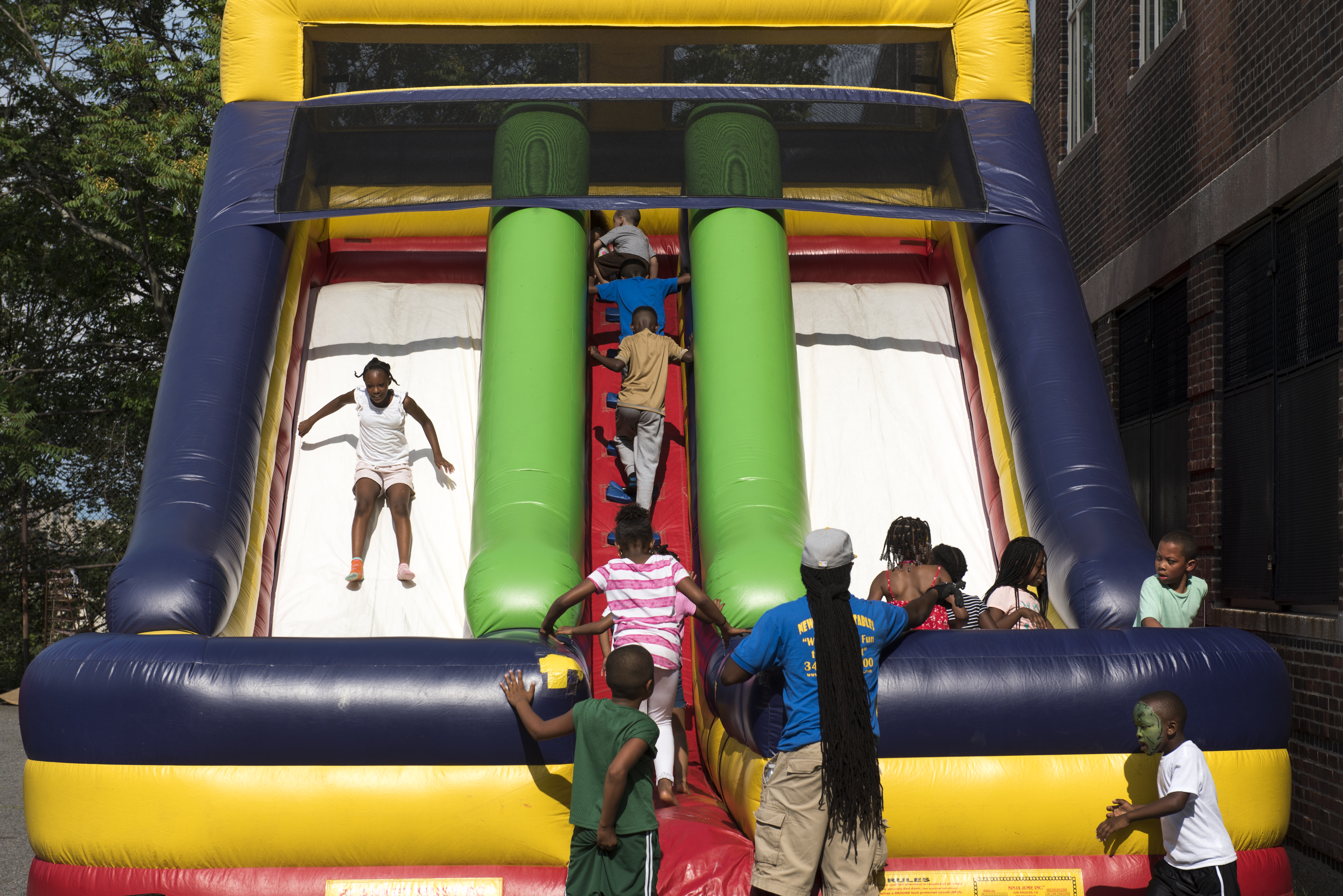 Attendance was free and included food, face painting, and a bounce house (above).