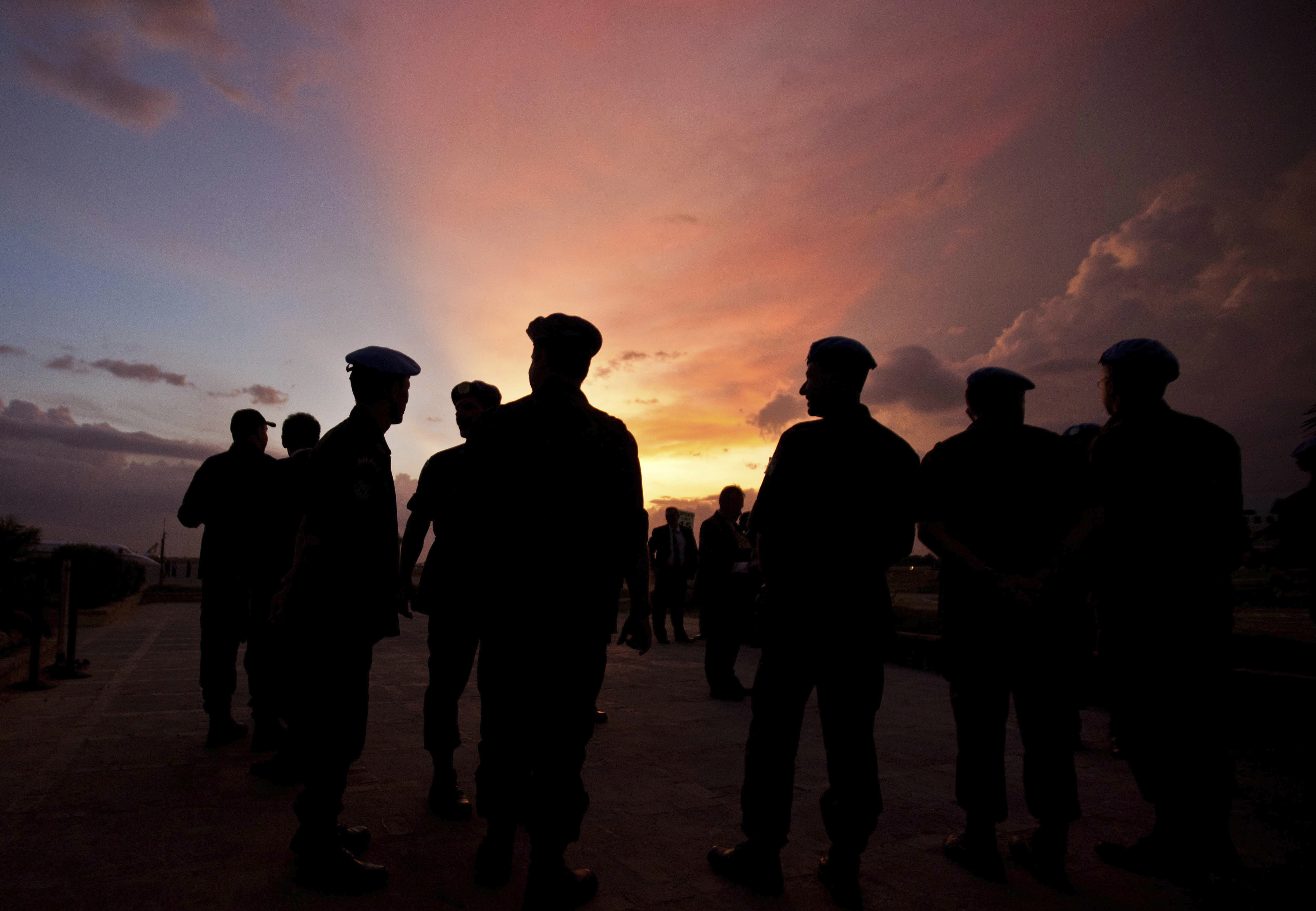 silhouettes of U.N. peacekeepers from Brazil at the airport in Port-au-Prince, Haiti in 2011.