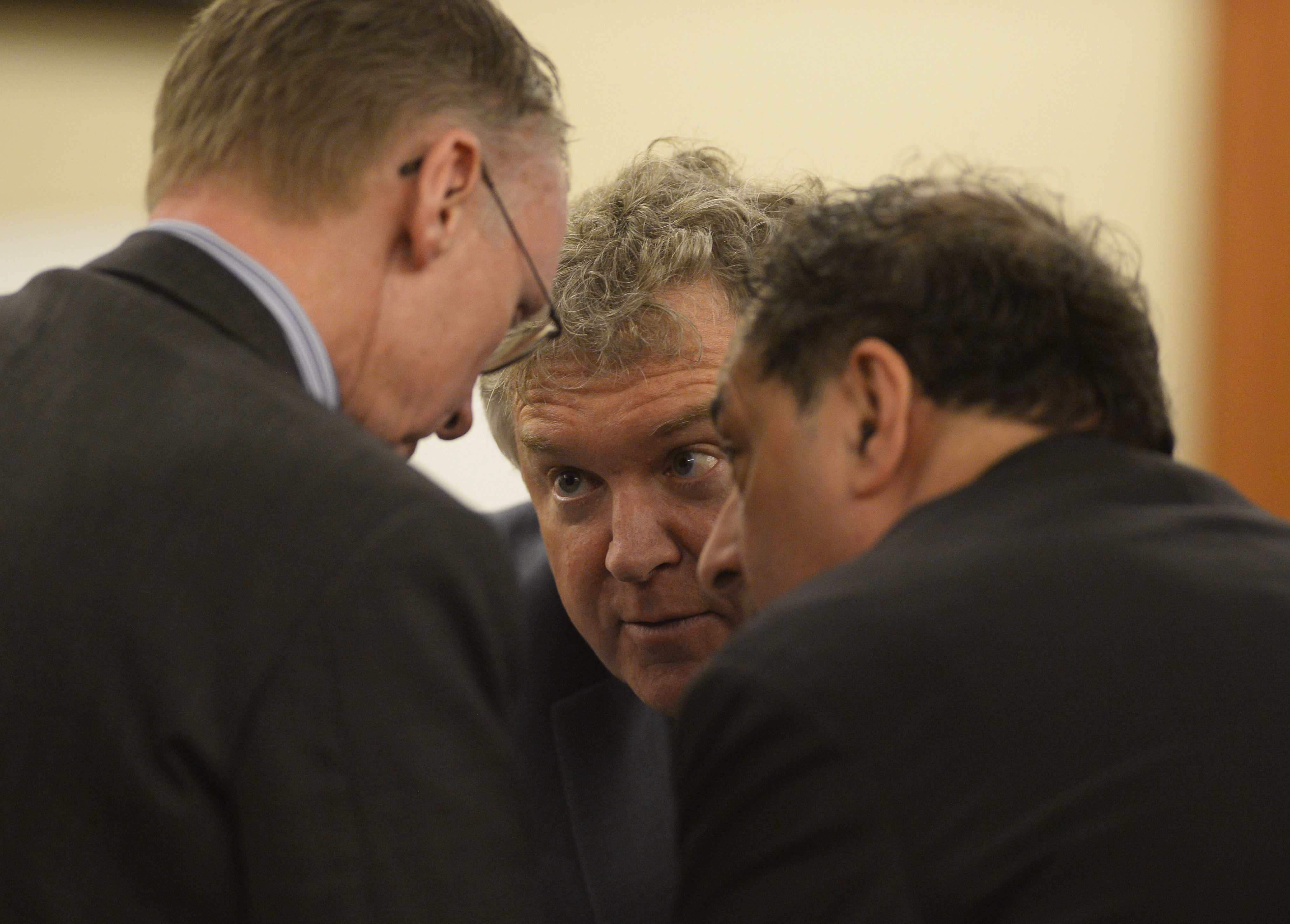 Hernandez lawyers Charles Rankin (left), Michael Fee (center), and James Sultan (right) conferred during the trial.