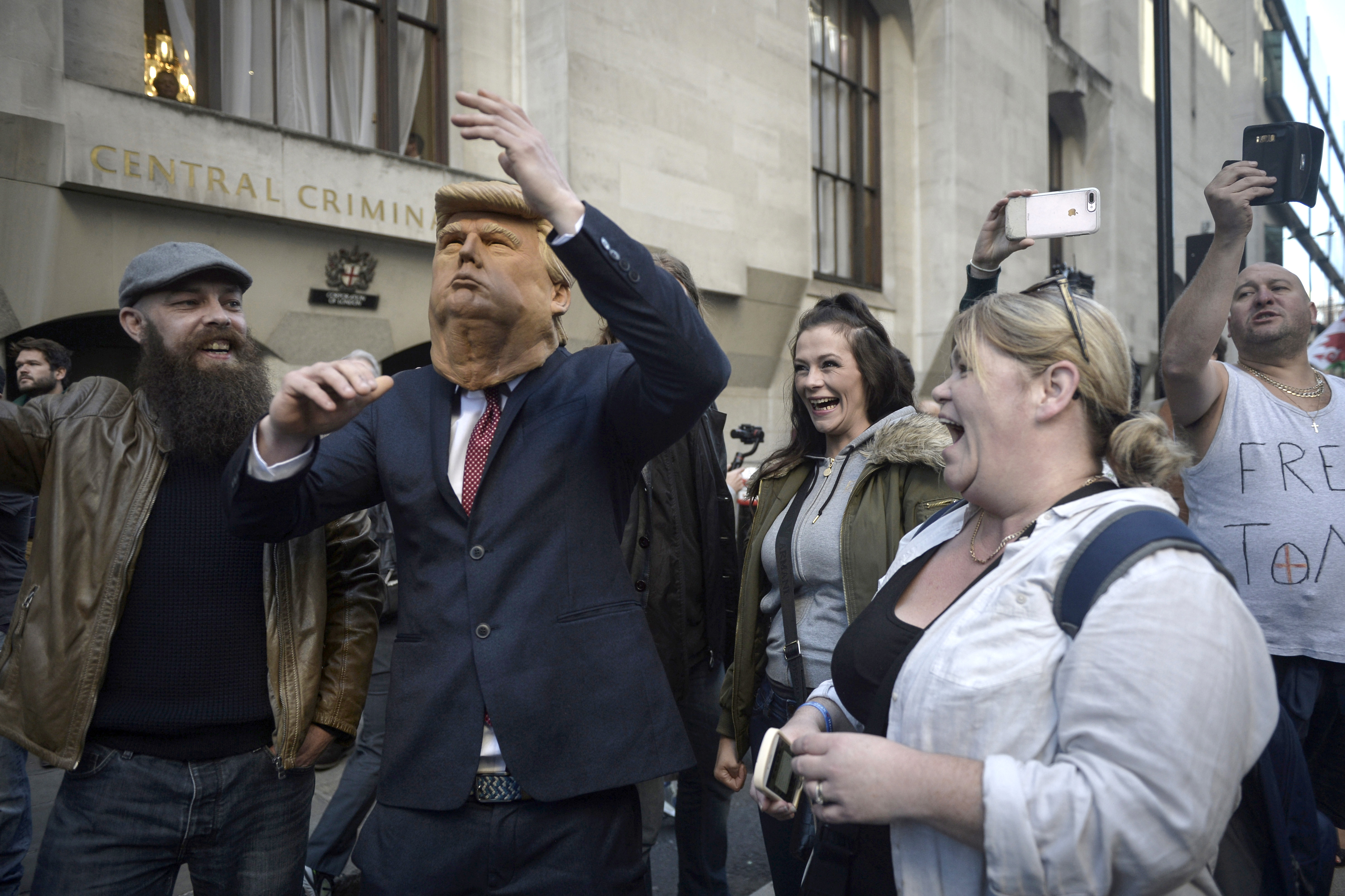 David Sumner, a supporter of Tommy Robinson, wore a Donald Trump mask at a September rally.
