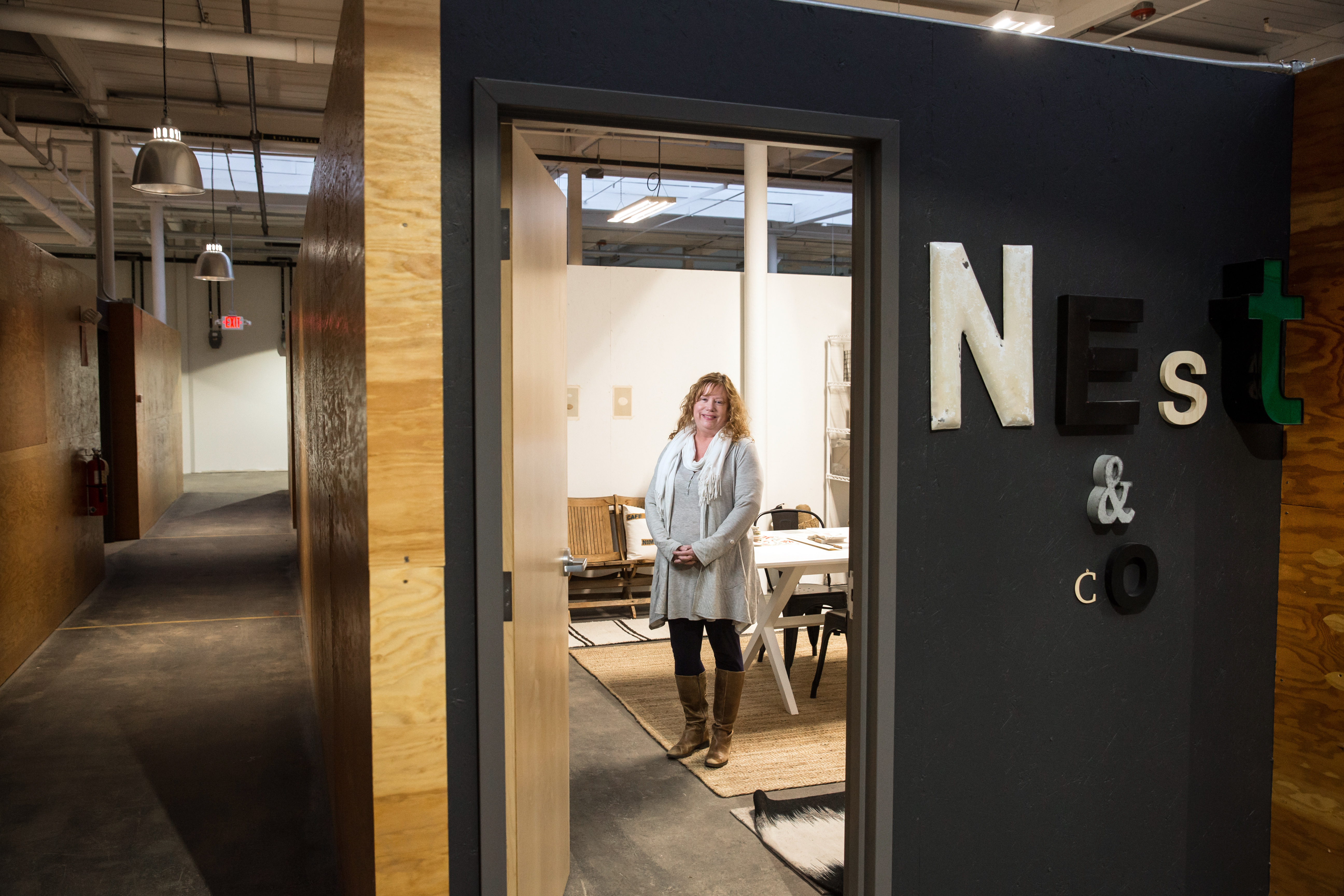 Interior designer Tracy Parkinson moved her Nest + Company office space from a loft building in Boston to the Norwood Space Center.