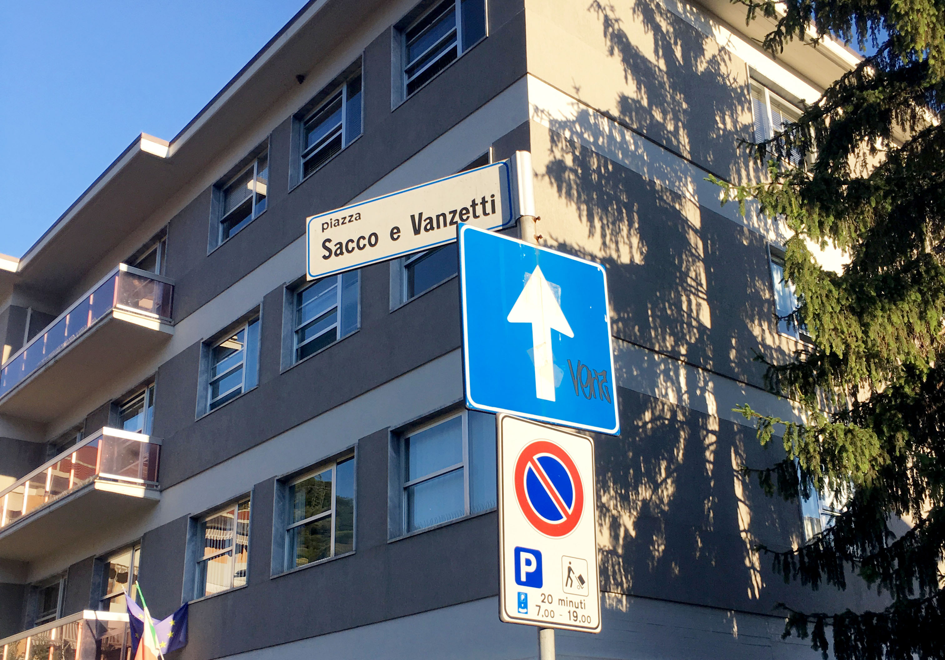 A sign marks the spot of Sacco and Vanzetti Piazza.