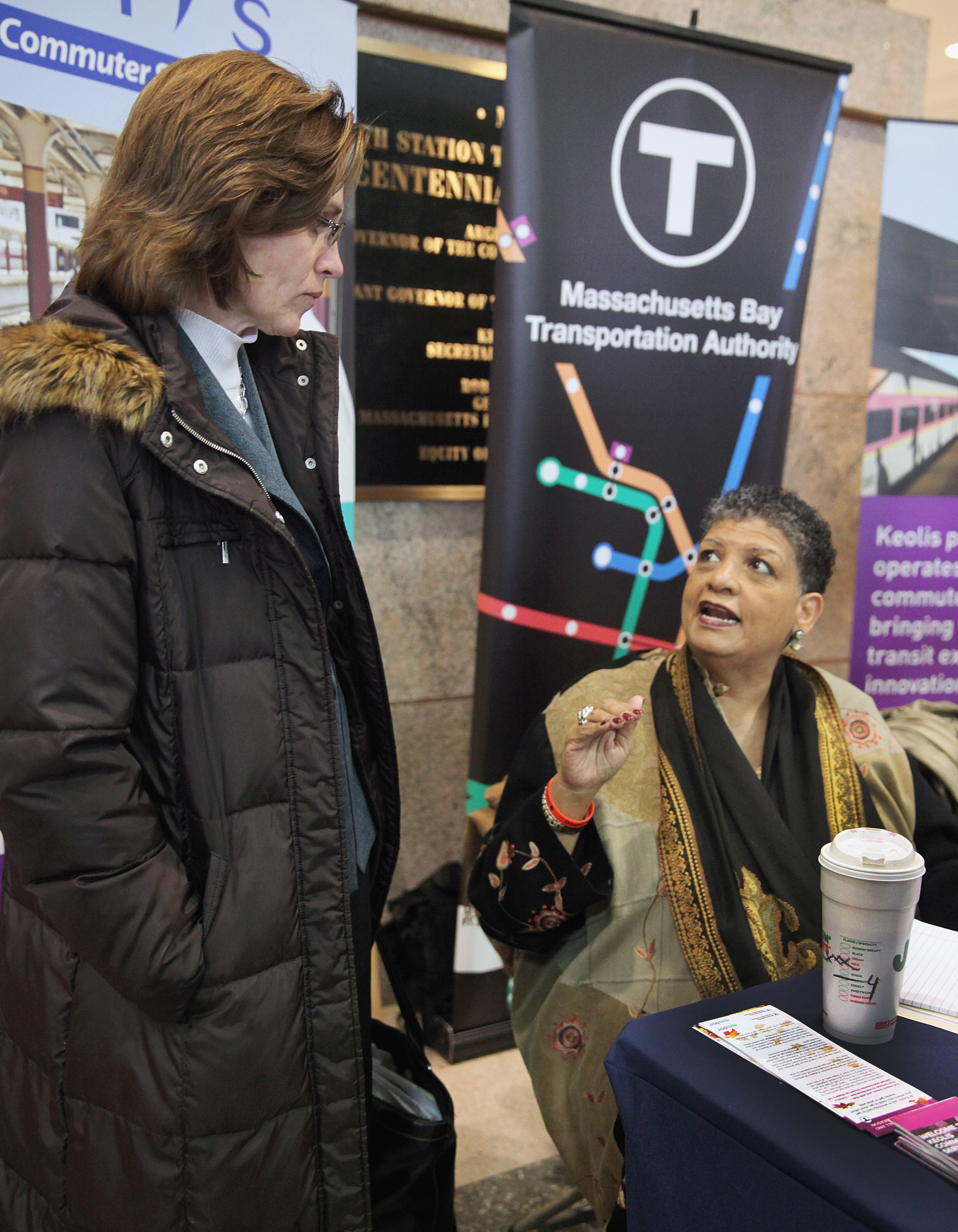 Wrentham resident Linda Lacke talked with the MBTA’s general manager, Beverly Scott, during an outreach event at South Station on Dec. 2.