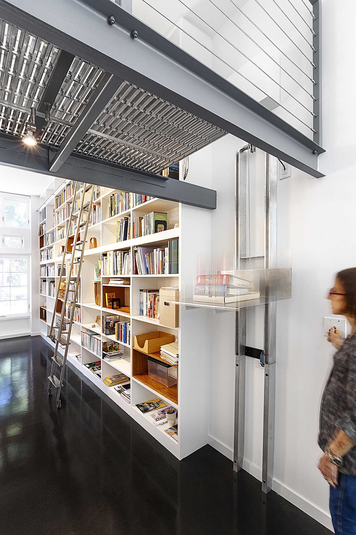Larson adapted an industrial hydraulic lift for transferring heavy items up to the catwalk