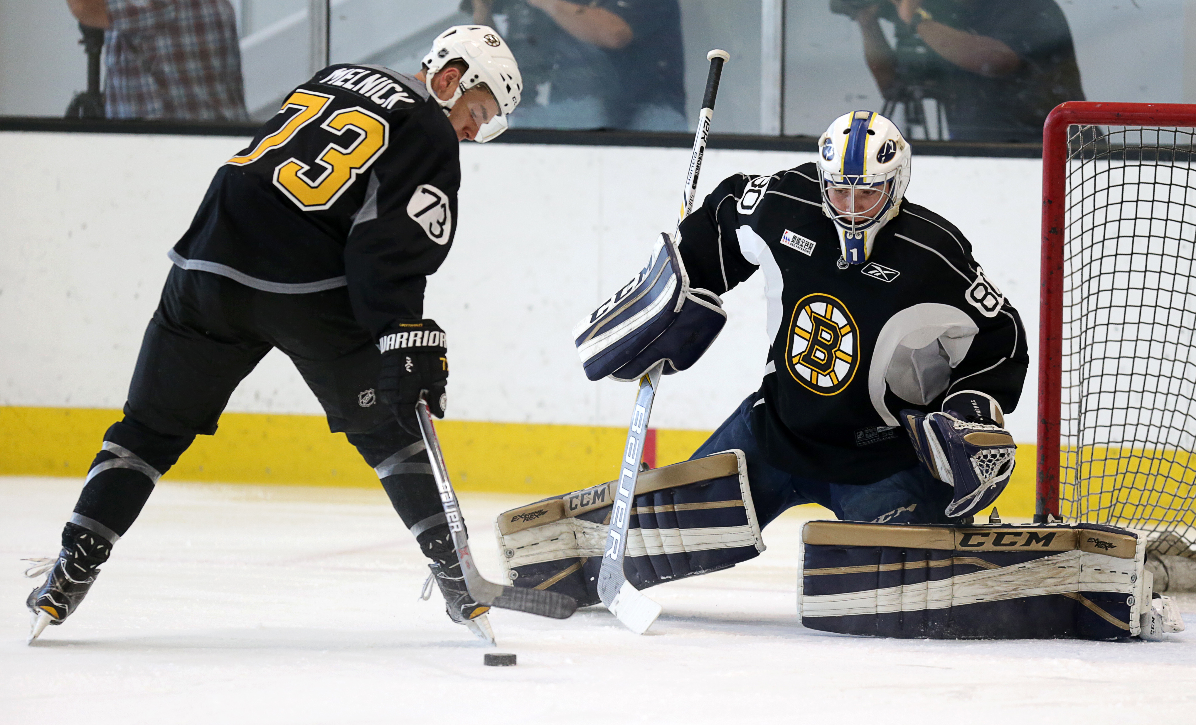 Josh Melnick shoots on Jeremy Swayman during D camp Thursday.