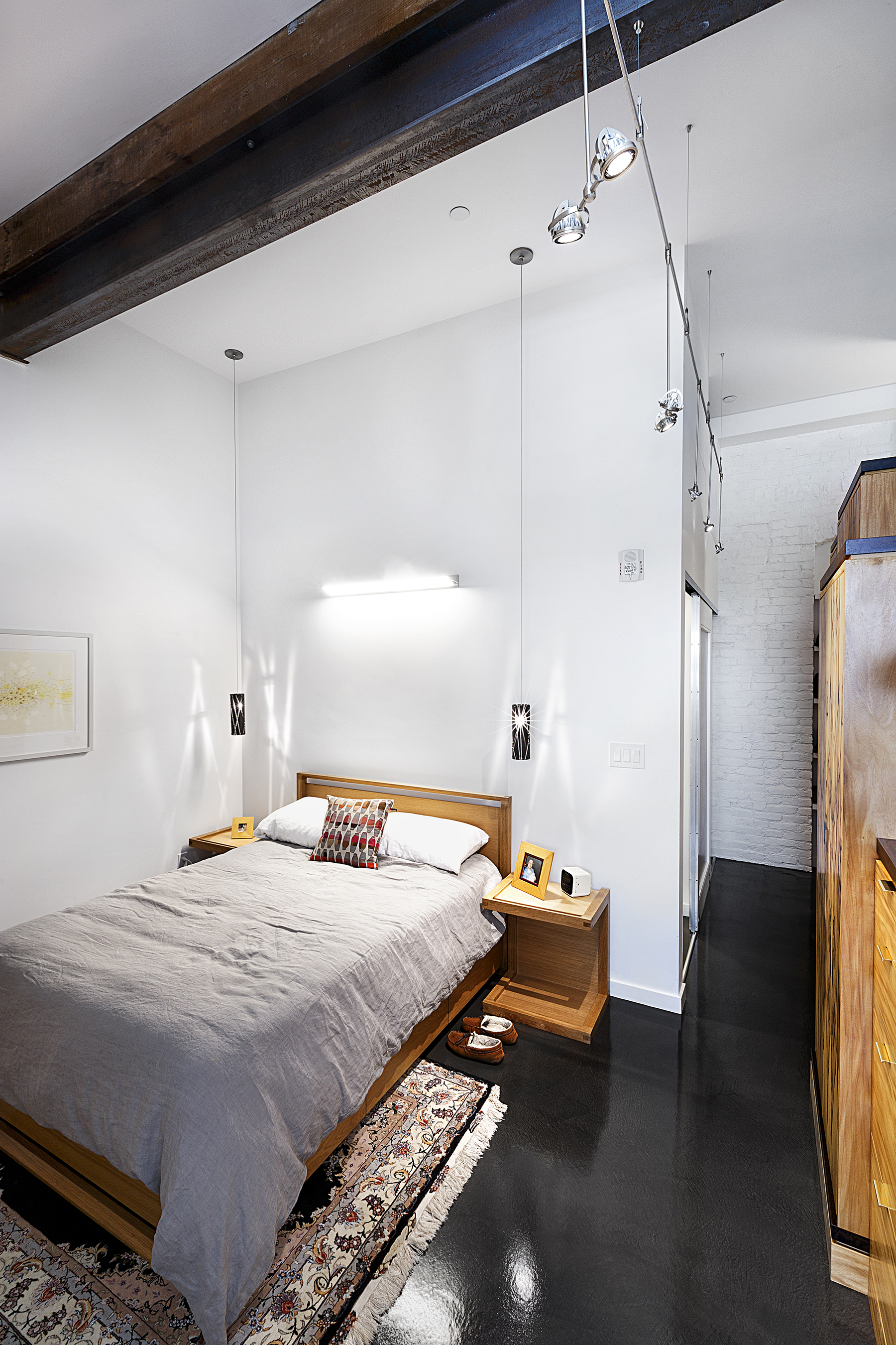 The master bedroom fits just what it needs. “It’s not a hangout space,” Larson says.