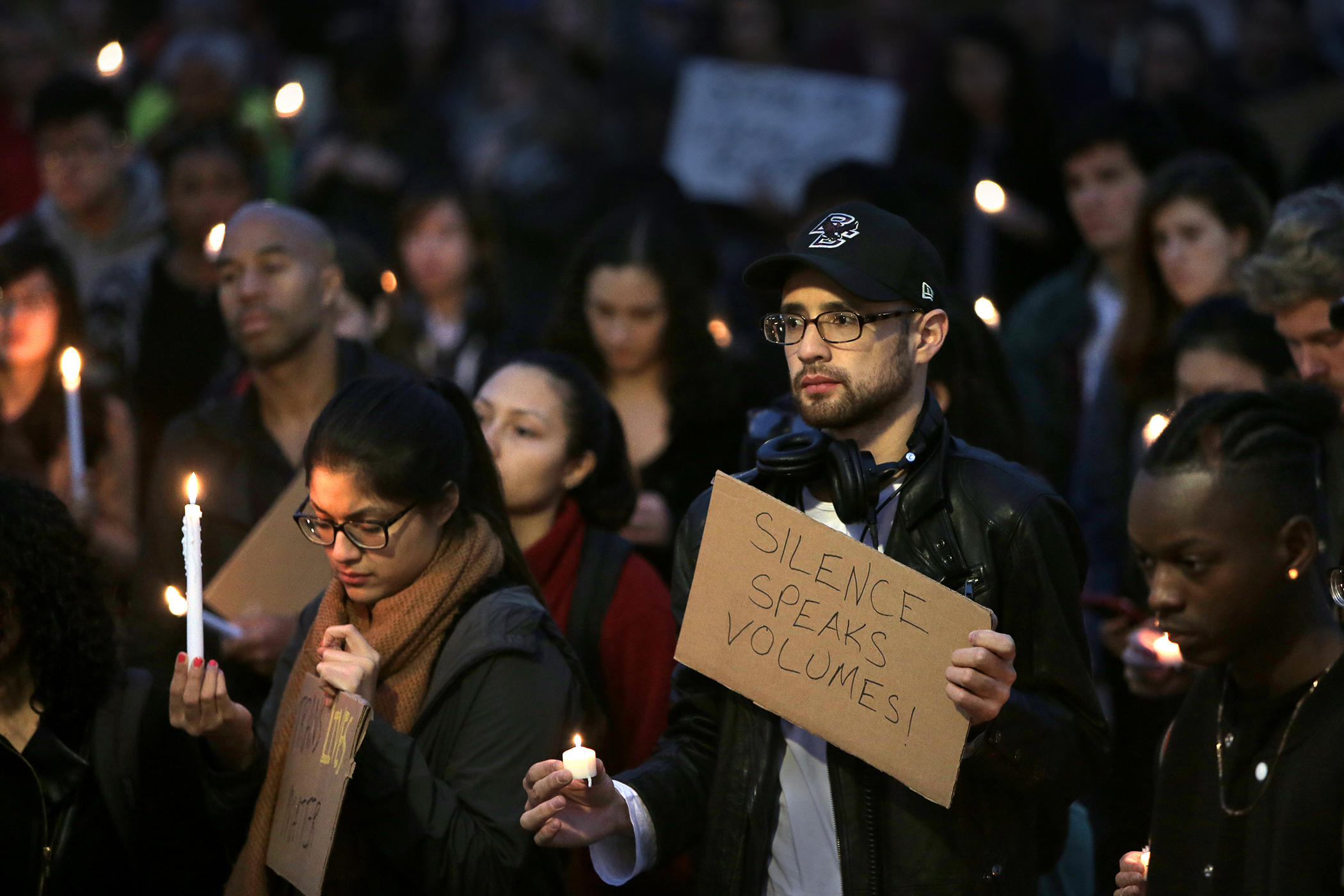 BC student Jonathan Sepulveda listened to speakers at a Stand Against Hate Rally on the campus of Boston College on Nov. 14.
