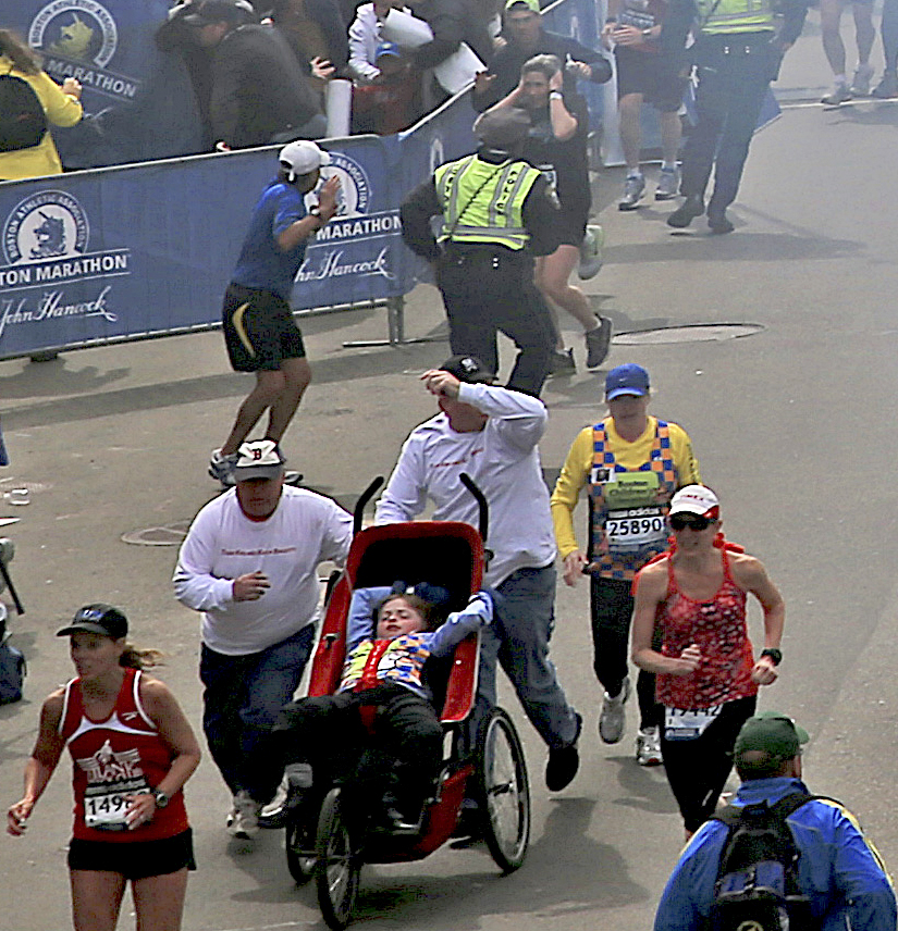Rick Biagiotti (left) and Brian Bridges helped Kris Biagiotti (yellow jersey) get Kayla to the finish after the first blast.