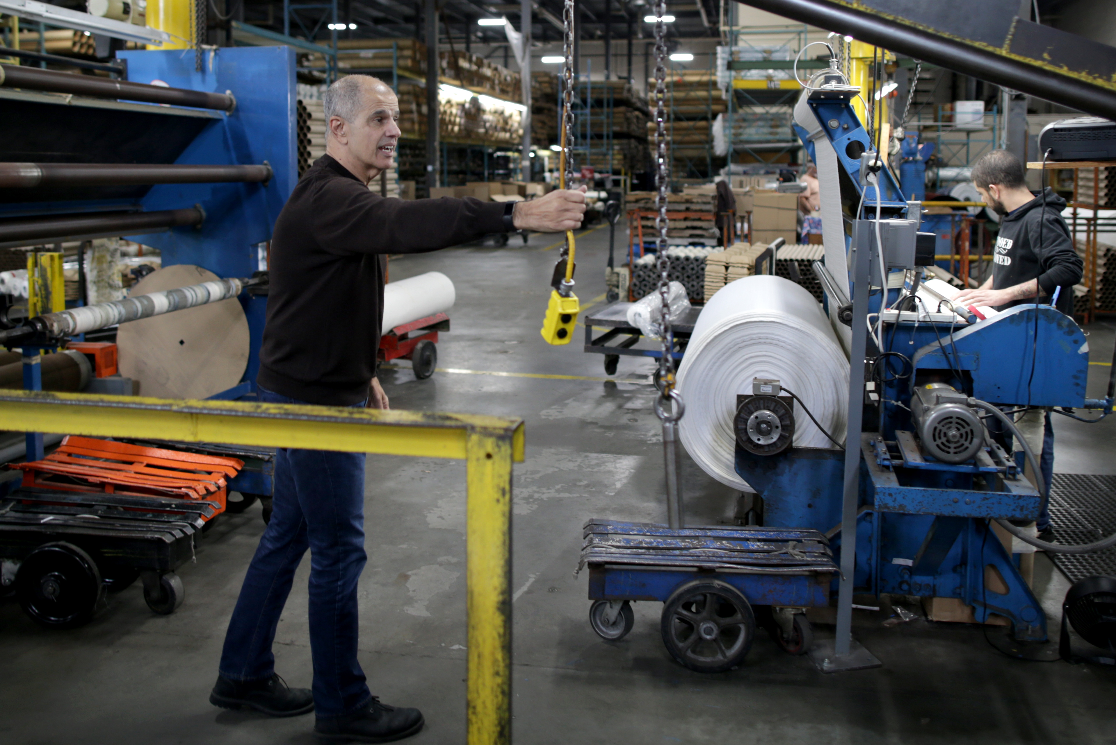 Mike Rodrigues at his textile company, Swan Fabrics.