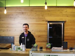 Jake Moriarty, a Patient Service Associate a.k.a. “Budtender” at NETA in Northampton, Mass.