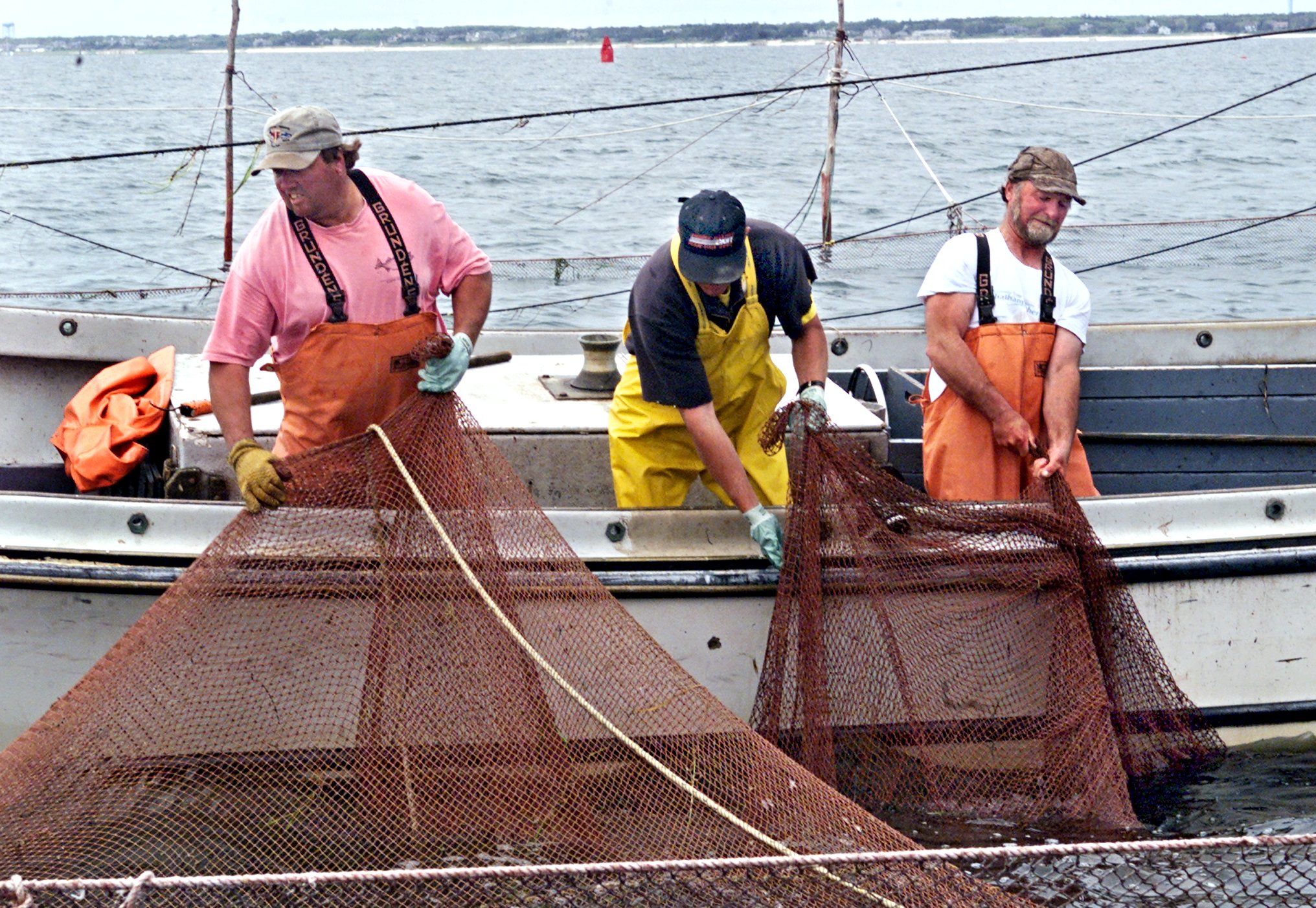 Ernie Eldredge (right) with David Davis (left) and brother John Eldredge.