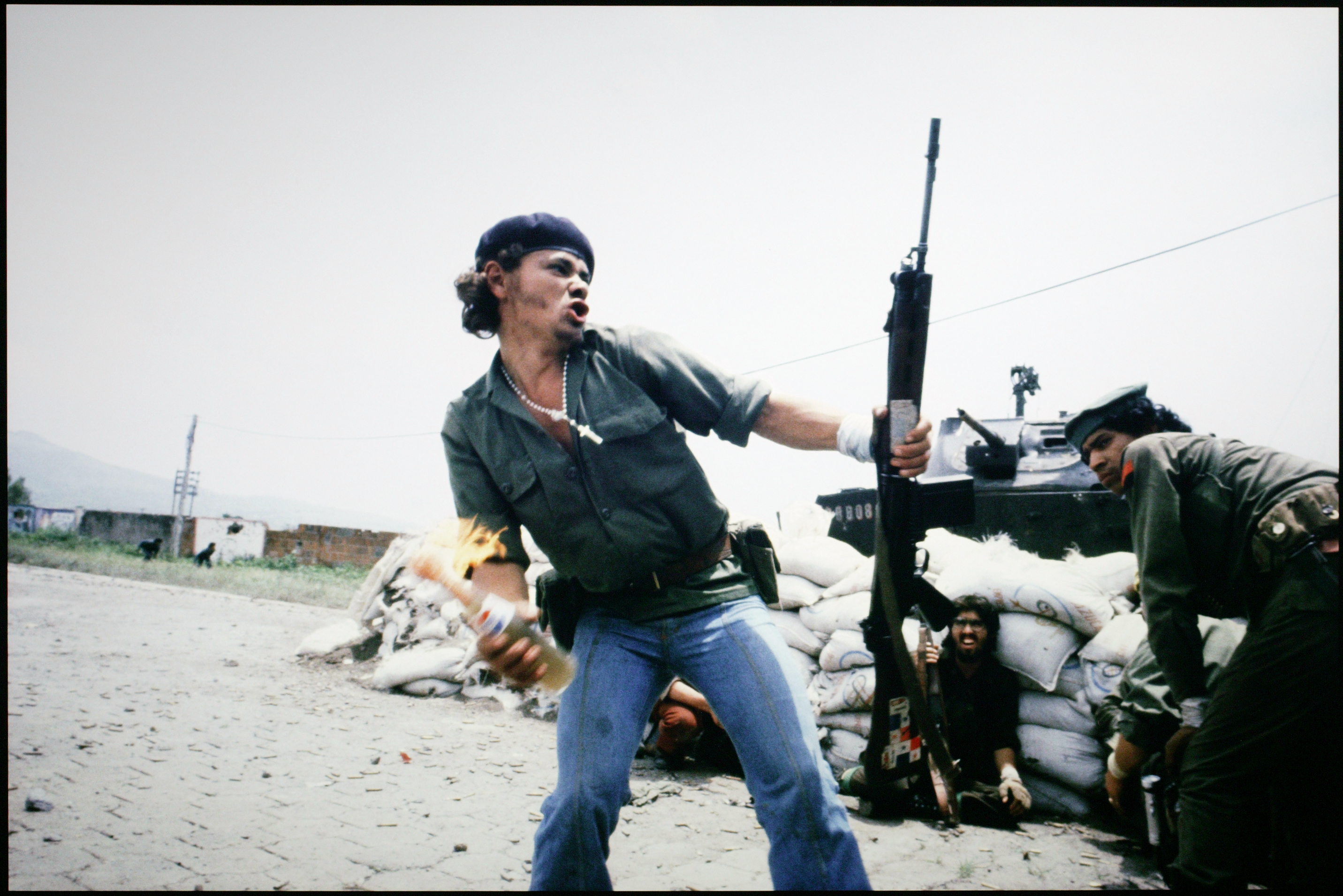 Sandinistas at the wall of the National Guard headquarters, Esteli, Nicaragua as seen in the 1991 documentary film “Pictures From a Revolution.”
