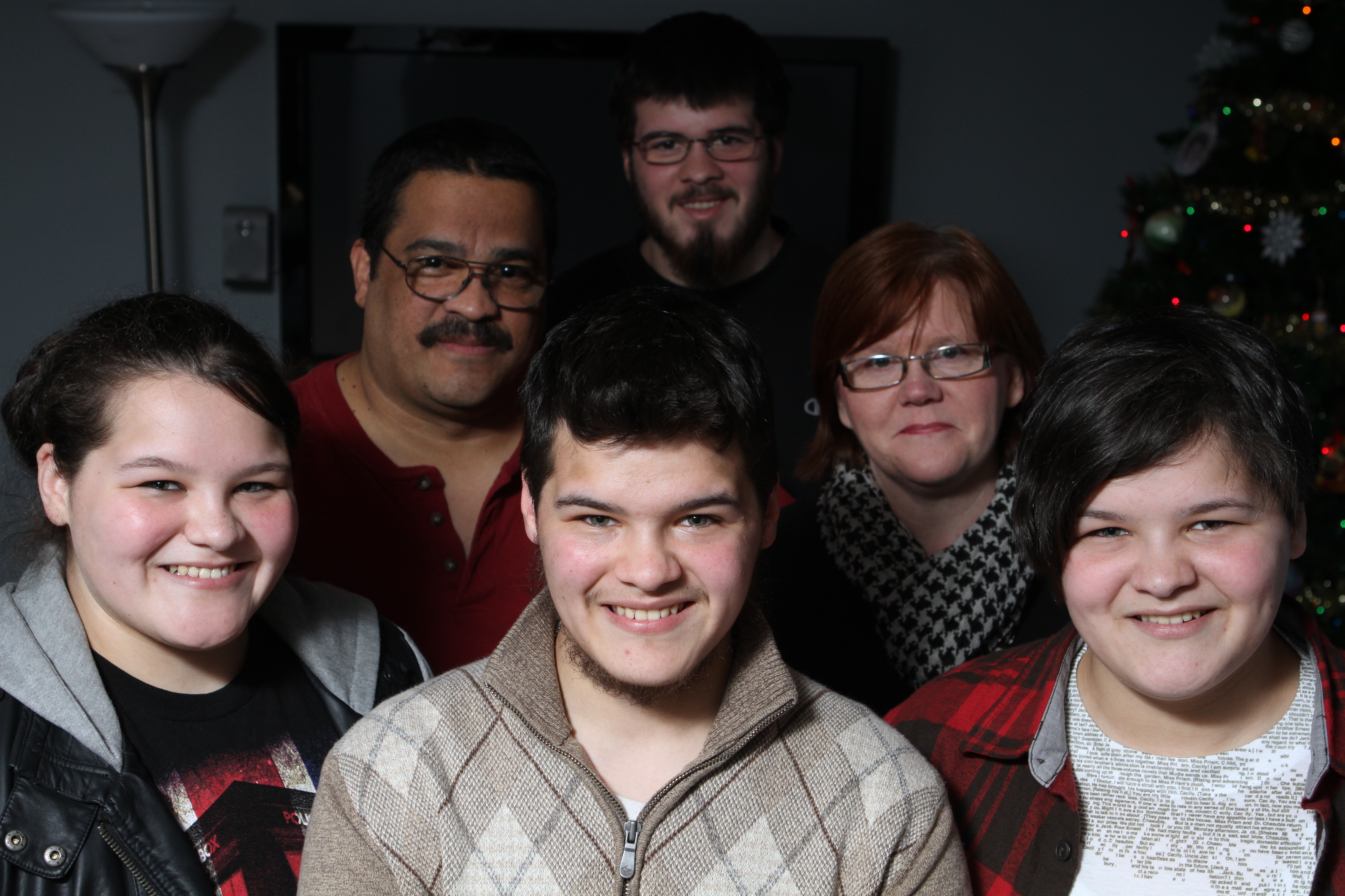 One of Zach’s brothers, Tim (in back), his parents, Gary and Grace, and Amy, Zach, and Sara.