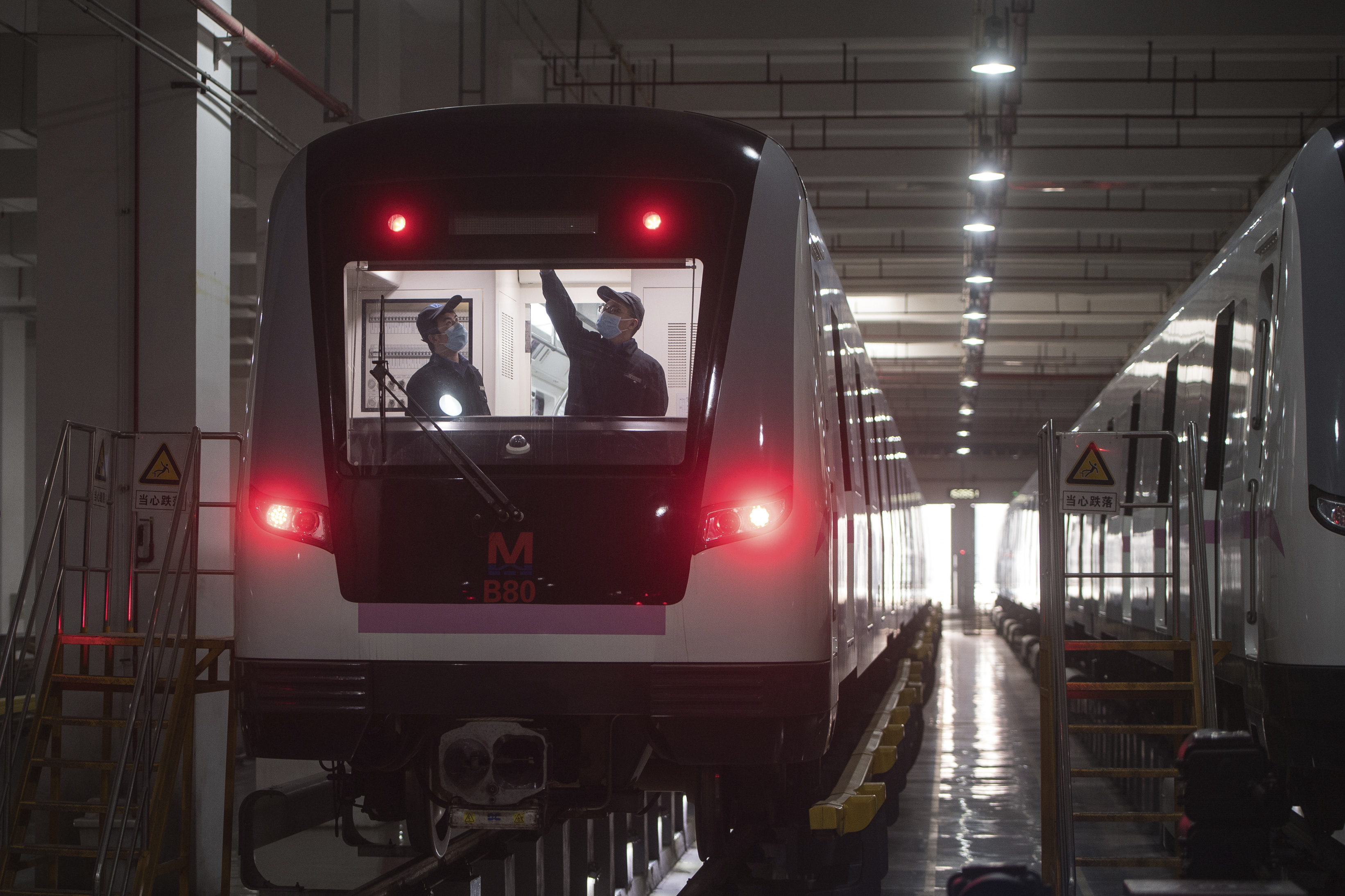 Workers prepared a subway train for the restoration of public transport in Wuhan, China.