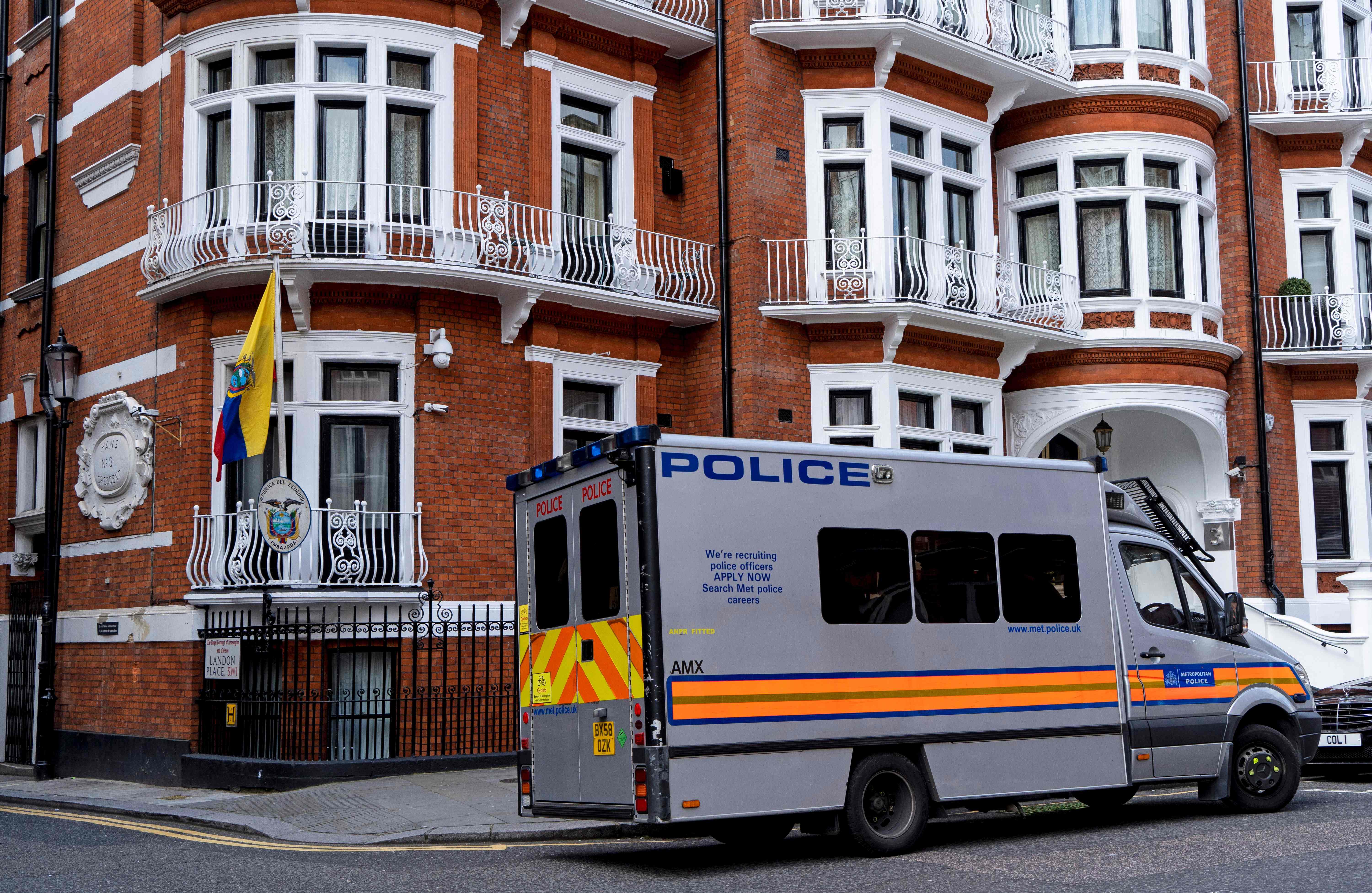 A police van is pictured outside of the Embassy of Ecuador in London on Thursday.