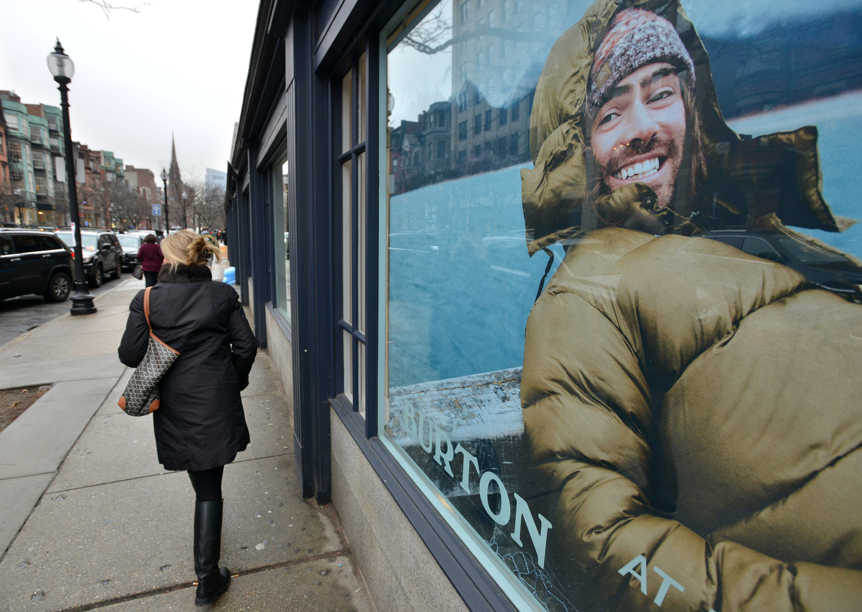 Pedestrians walked past a Burton pop-up shop on Boston’s Newbury Street in 2016.