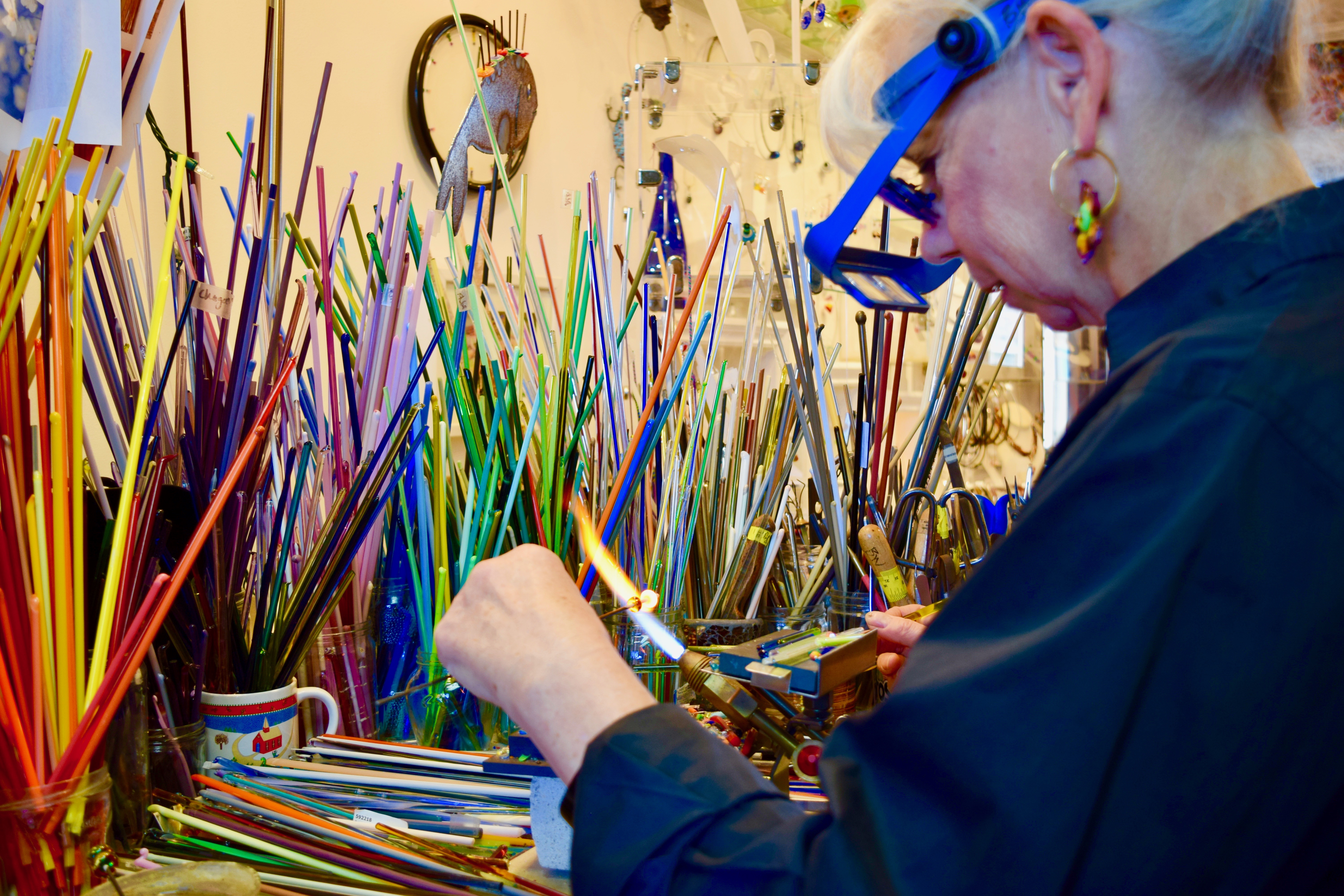 Beth Williams created a pair of glass earrings in her Gloucester studio.