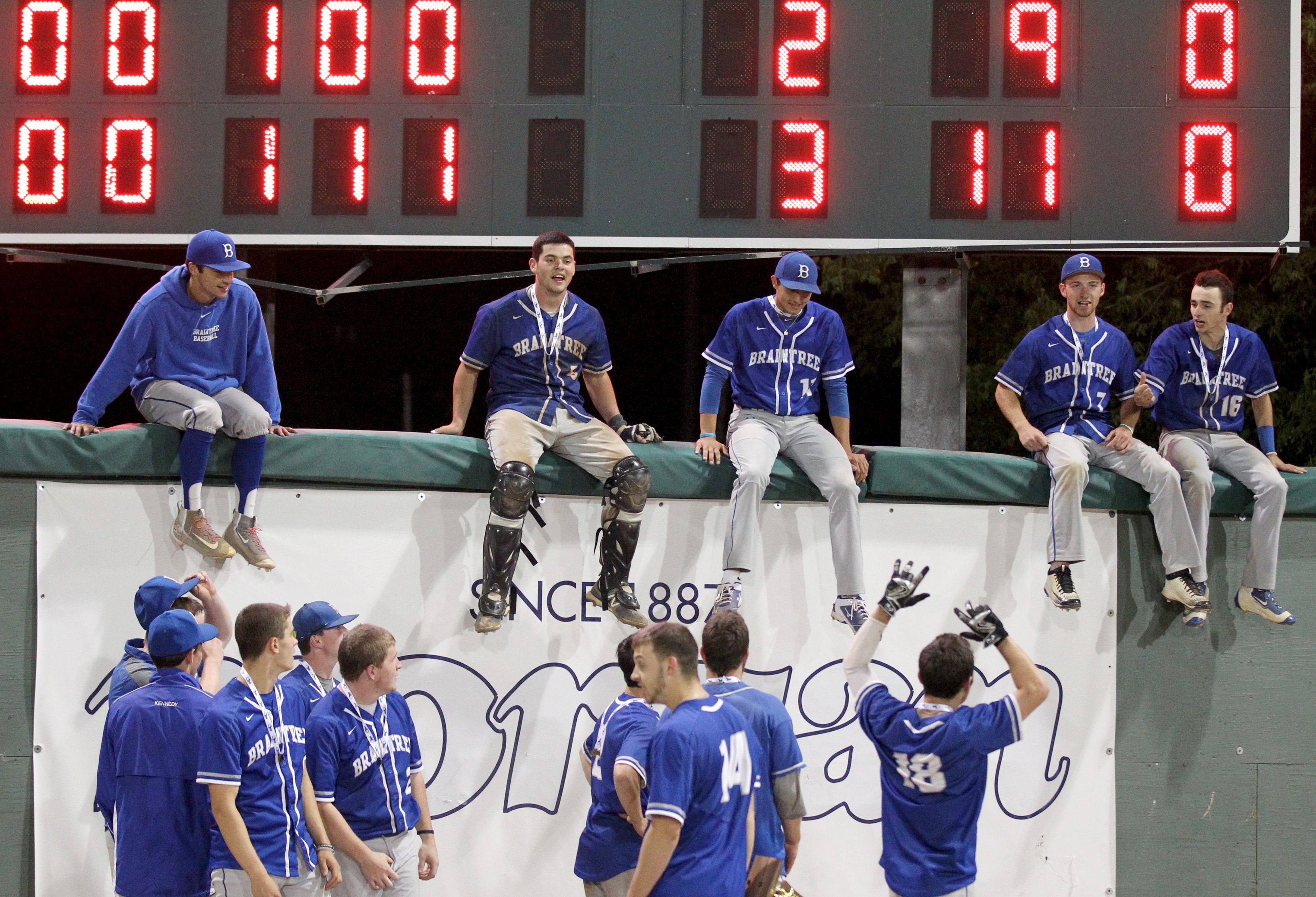 Braintree players celebrate after winning the Super 8 baseball championship.