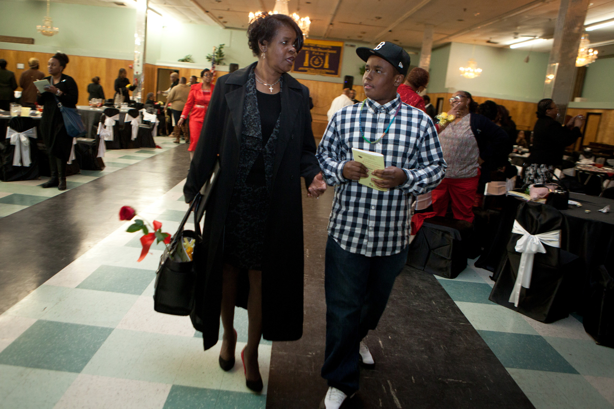 With her grandson, CJ Mills, Dianne Wilkerson left an event where she was honored.