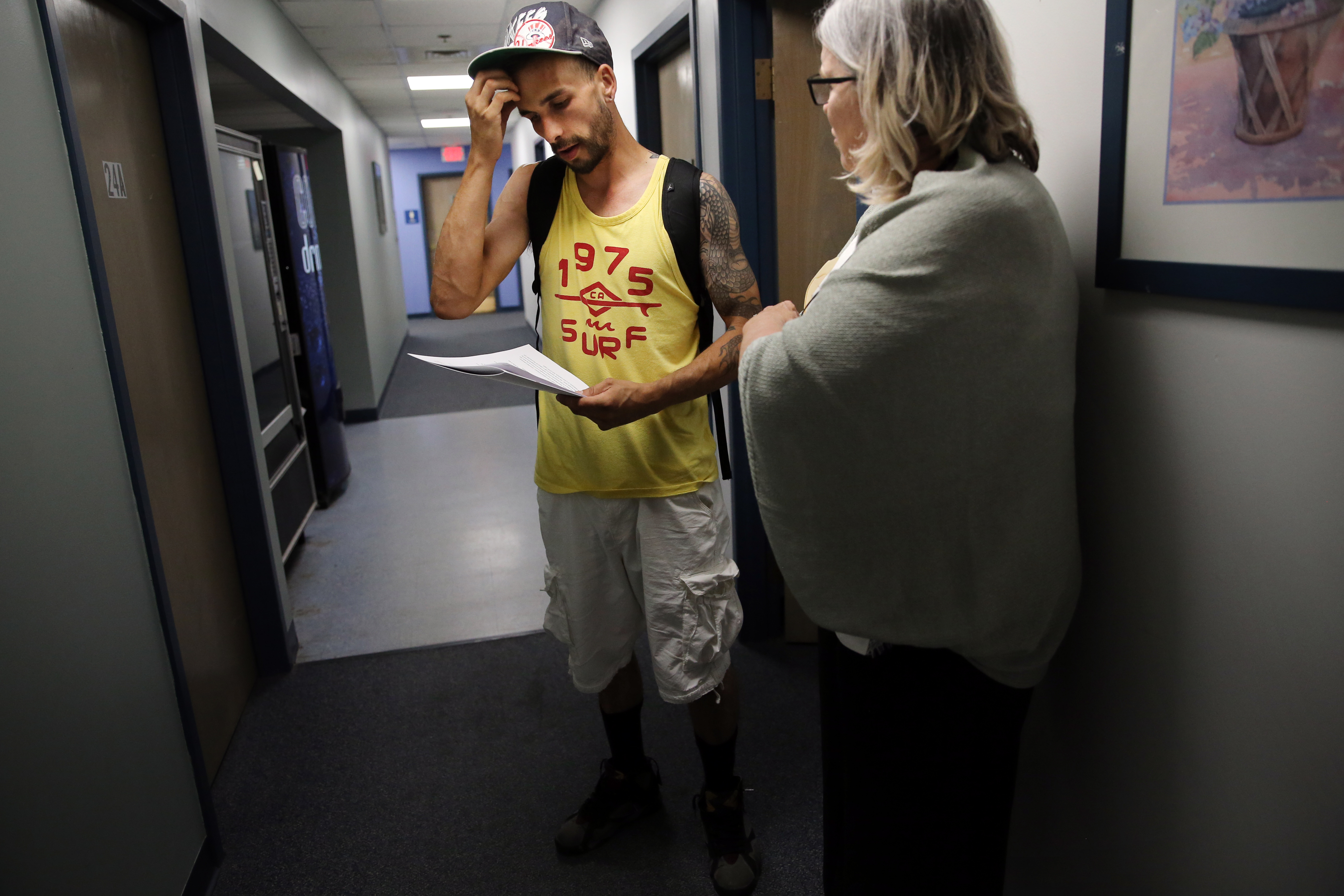 OTC Clinician Kathy Belanger (right) talked with Michael Wahl of Fall River.