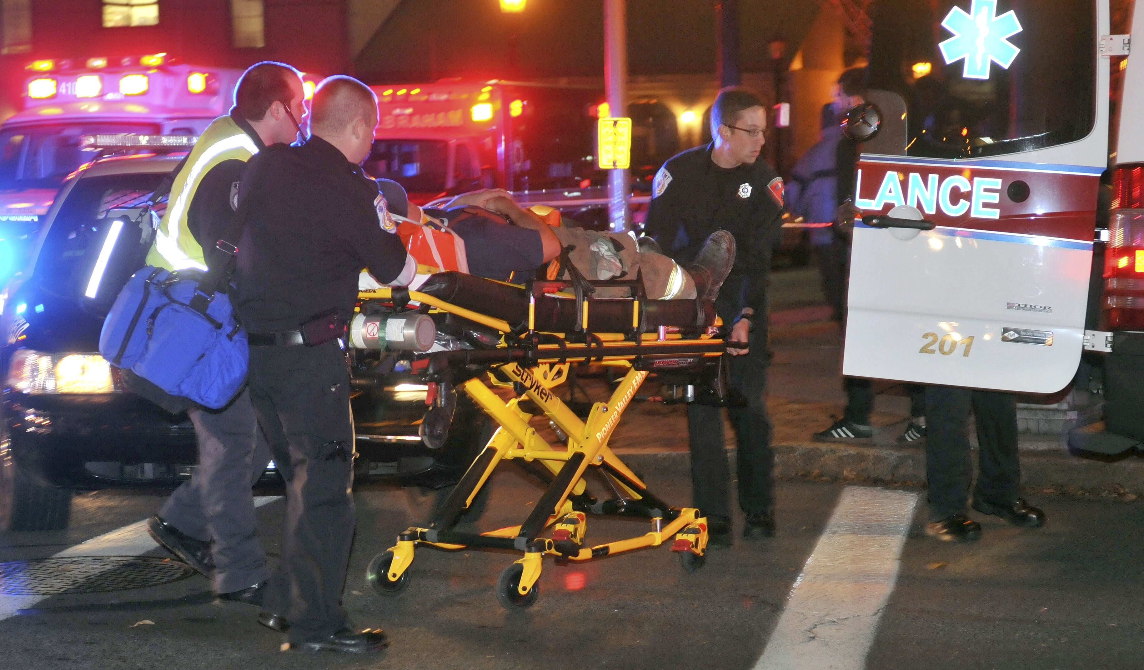 An injured firefighter was taken from the scene of an explosion in Springfield that leveled a downtown building.