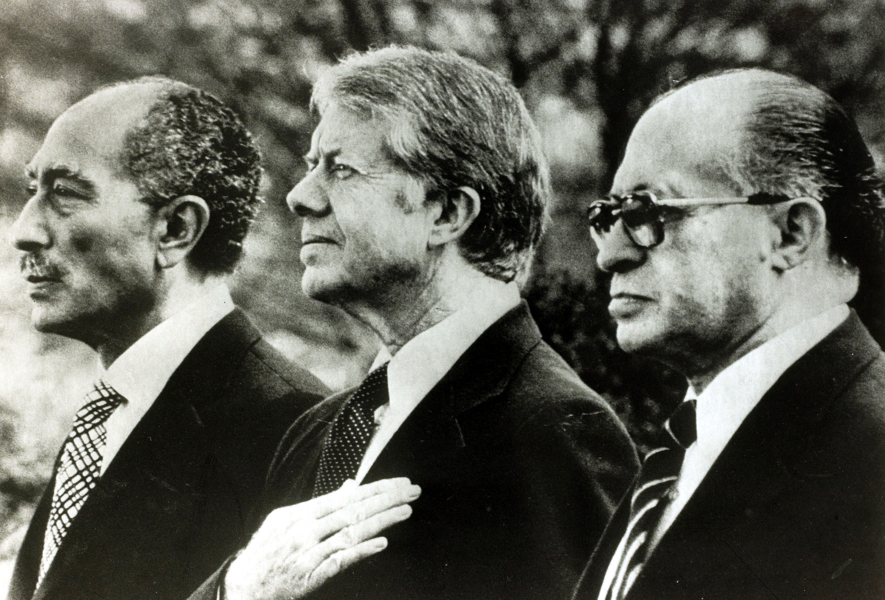 US President Jimmy Carter, Egypt’s Anwar Sadat, left, and Israel’s Menachem Begin stand on March 26, 1979, shortly before the signing of the Middle East peace treaty.