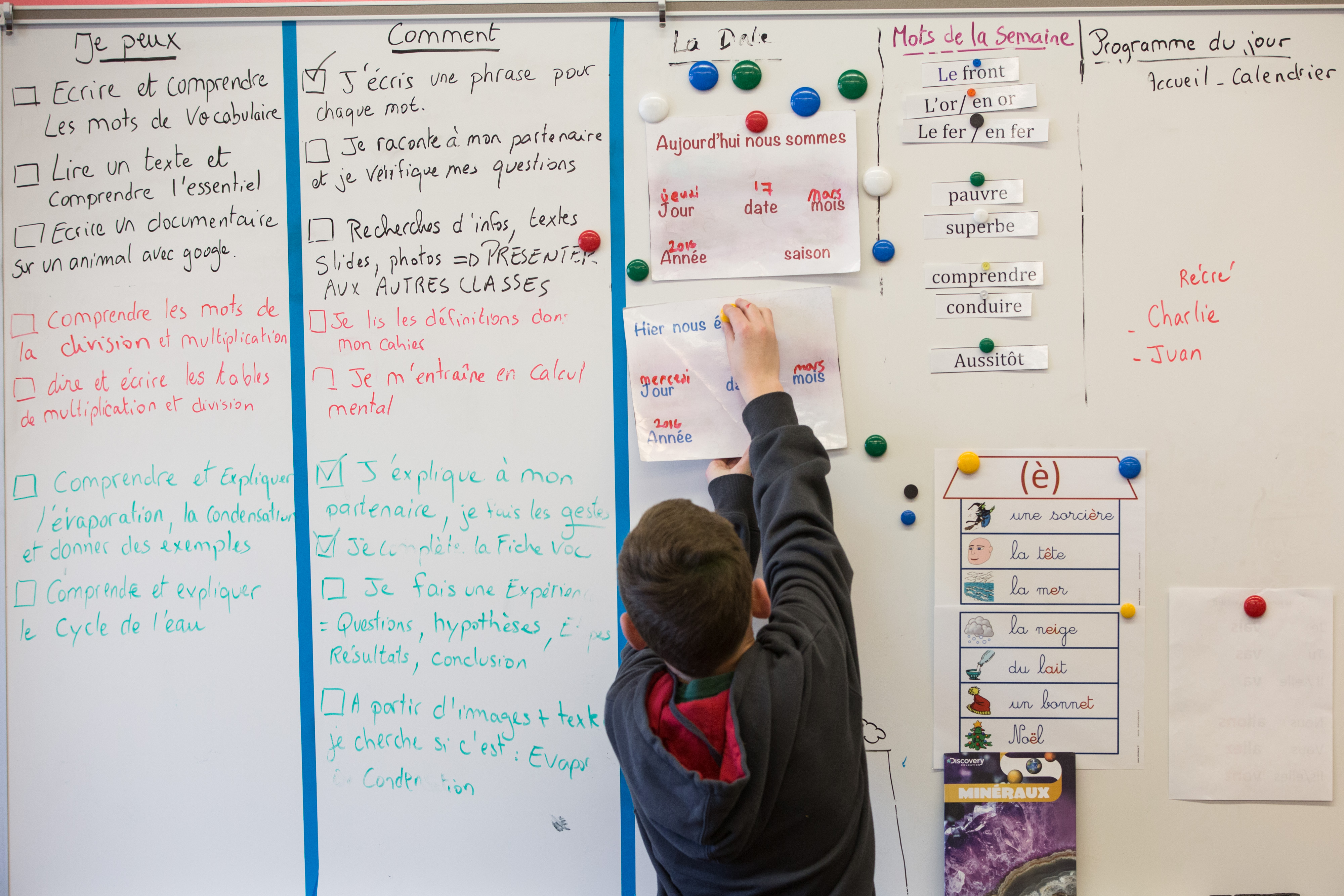 A student wrote in French on a white board at Park City’s Trailside Elementary School.