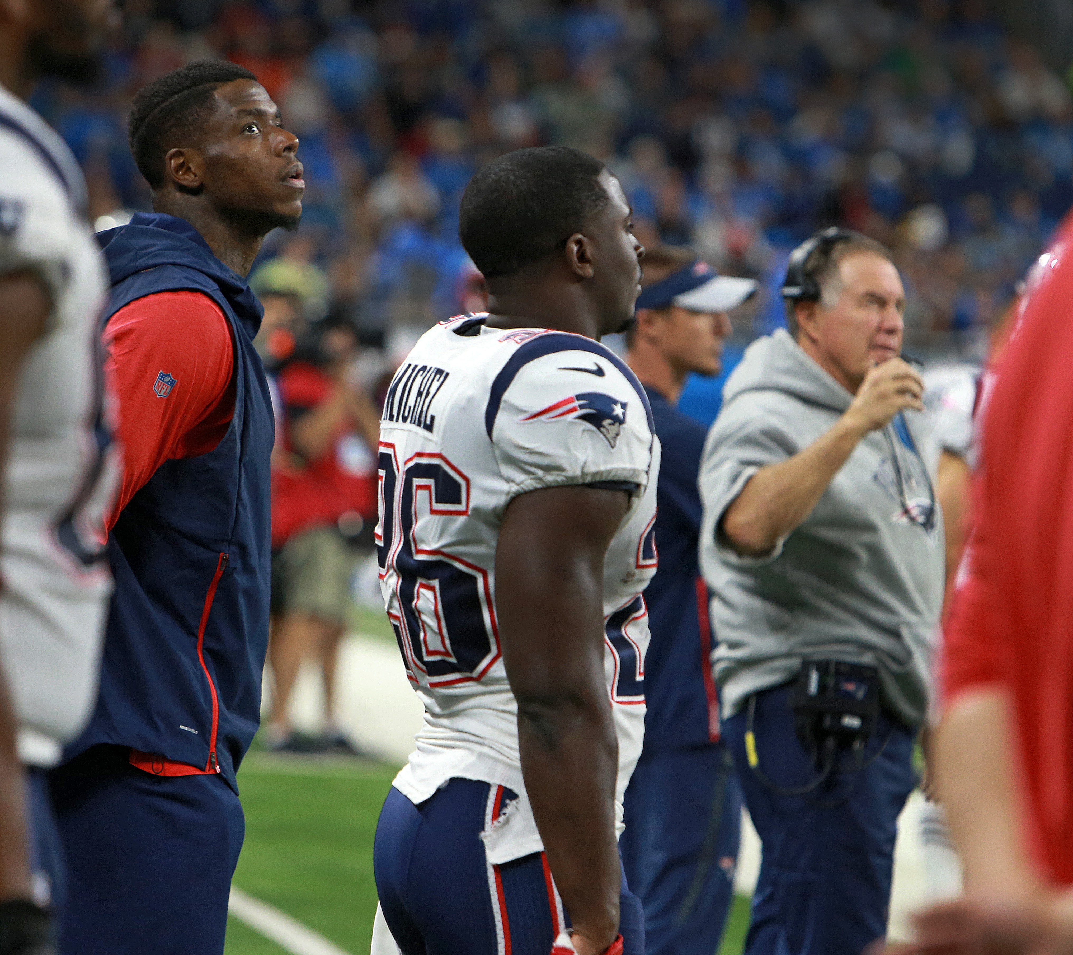 Coach Bill Belichick decided agaisnt dressing receiver Josh Gordon (left) for the game. They are pictured on the sidelines just before the start of the game.