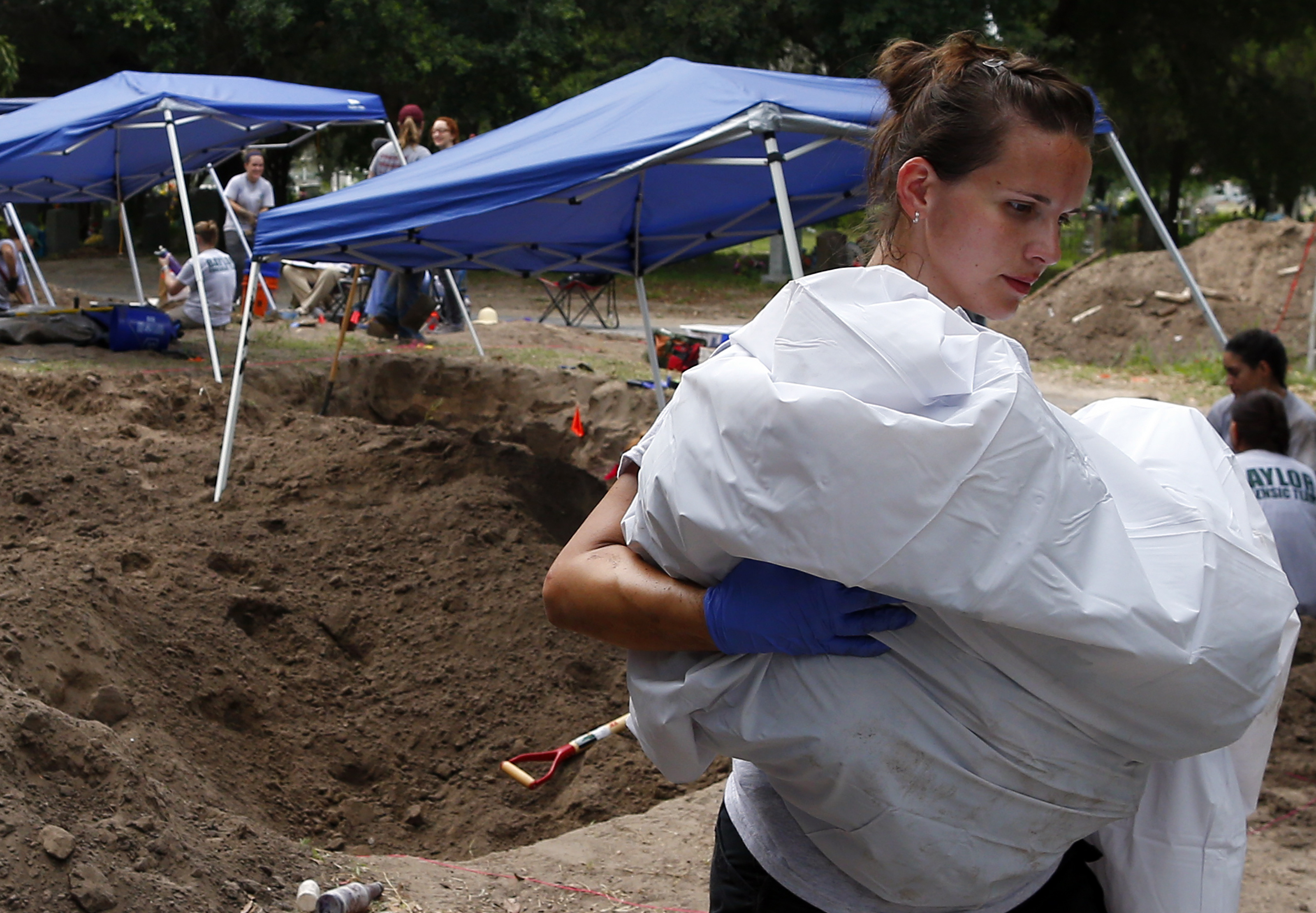 Ashley Roy, who works for the Waco Police Department, helped members of the Baylor team to exhume bodies.