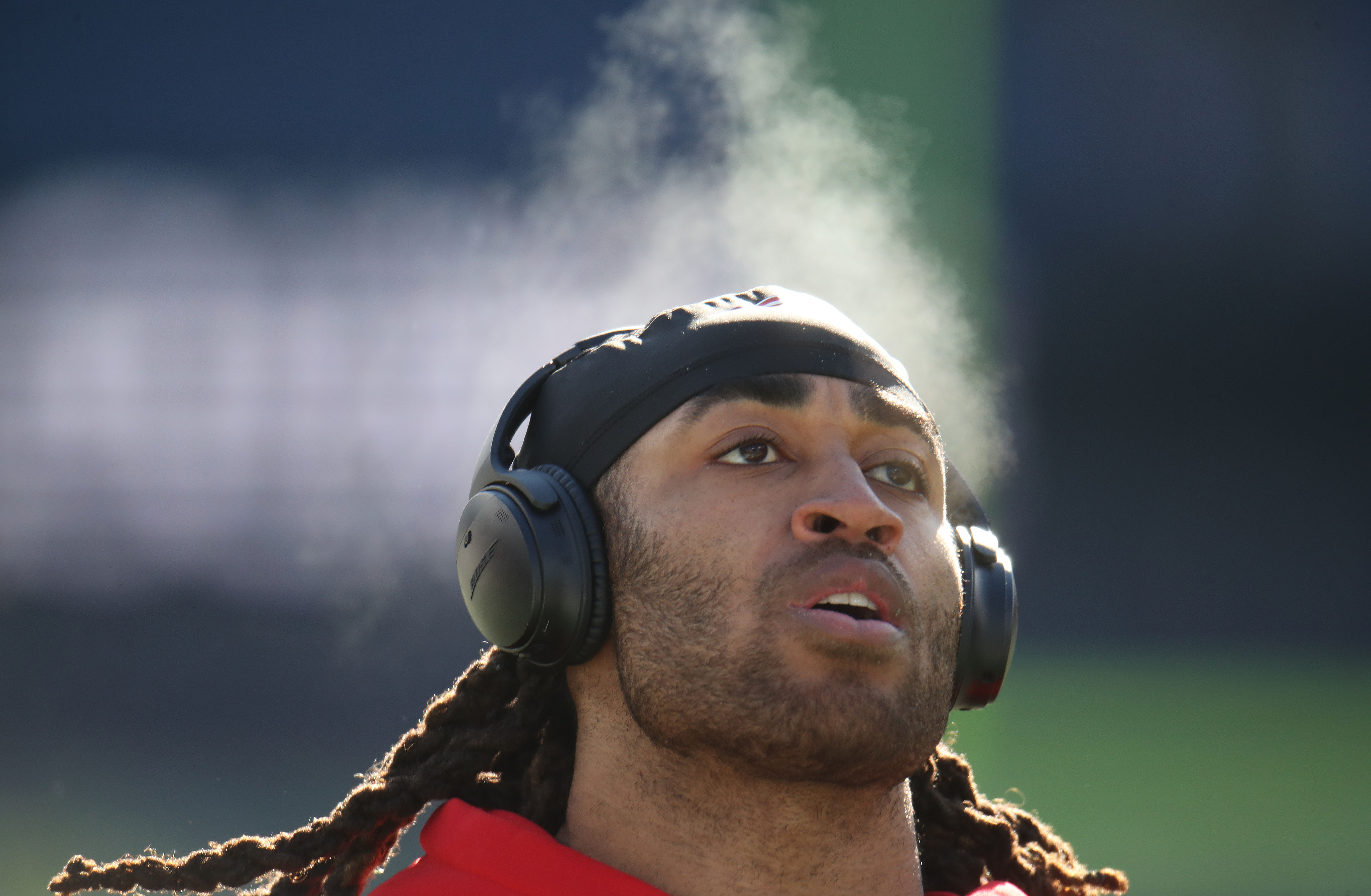 Gilmore warms up before the game.
