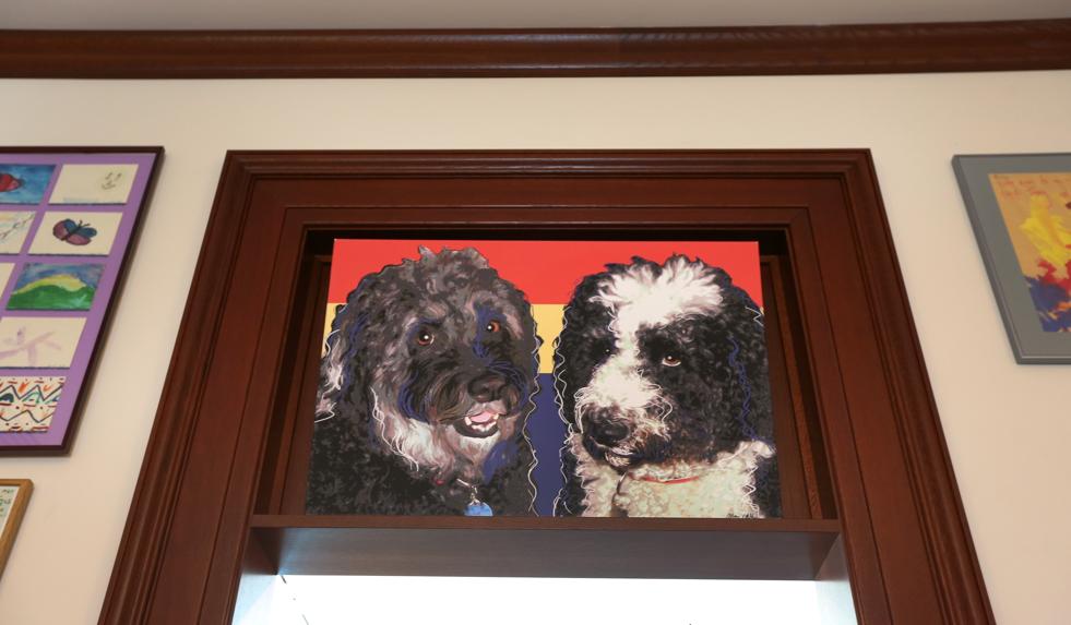 A photo of Kennedy’s two dogs hangs over the doorway of his office replica.