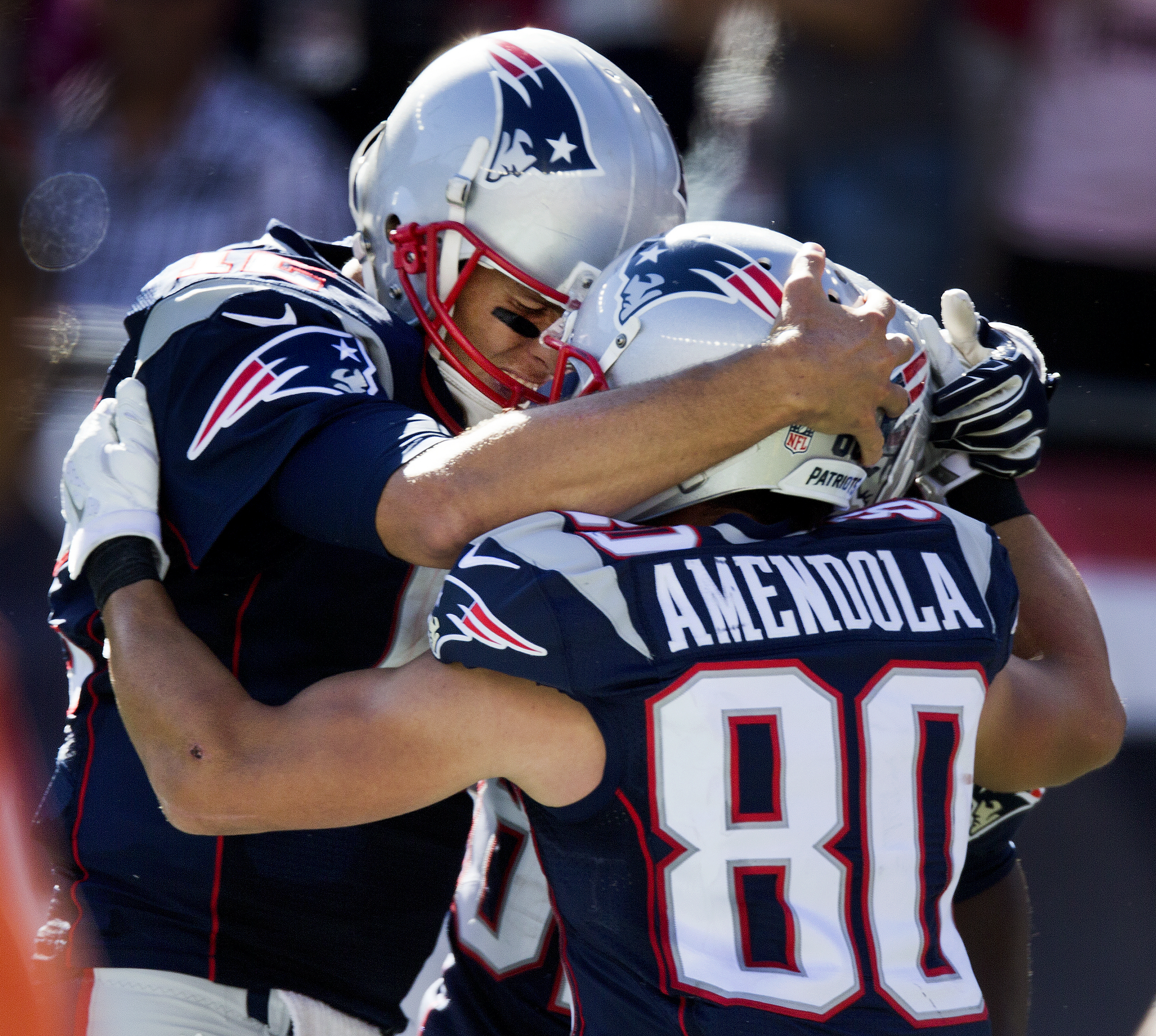 Tom Brady (left) may need to call Danny Amendola’s number more in the second half of the season now that Dion Lewis is gone from the Patriot offense.