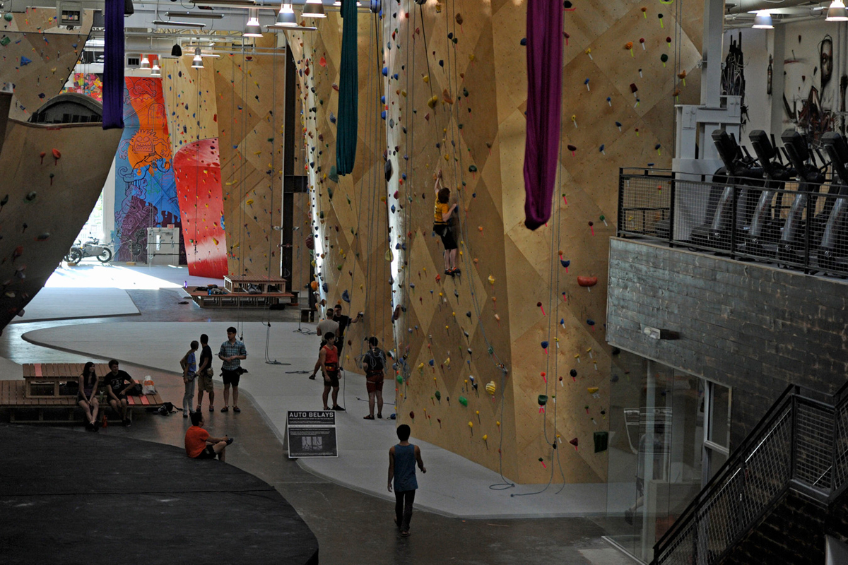 Coworking space has caught on in a big way in Greater Boston, though not everyone needs rock climbing nearby, such as at Brooklyn Boulders.