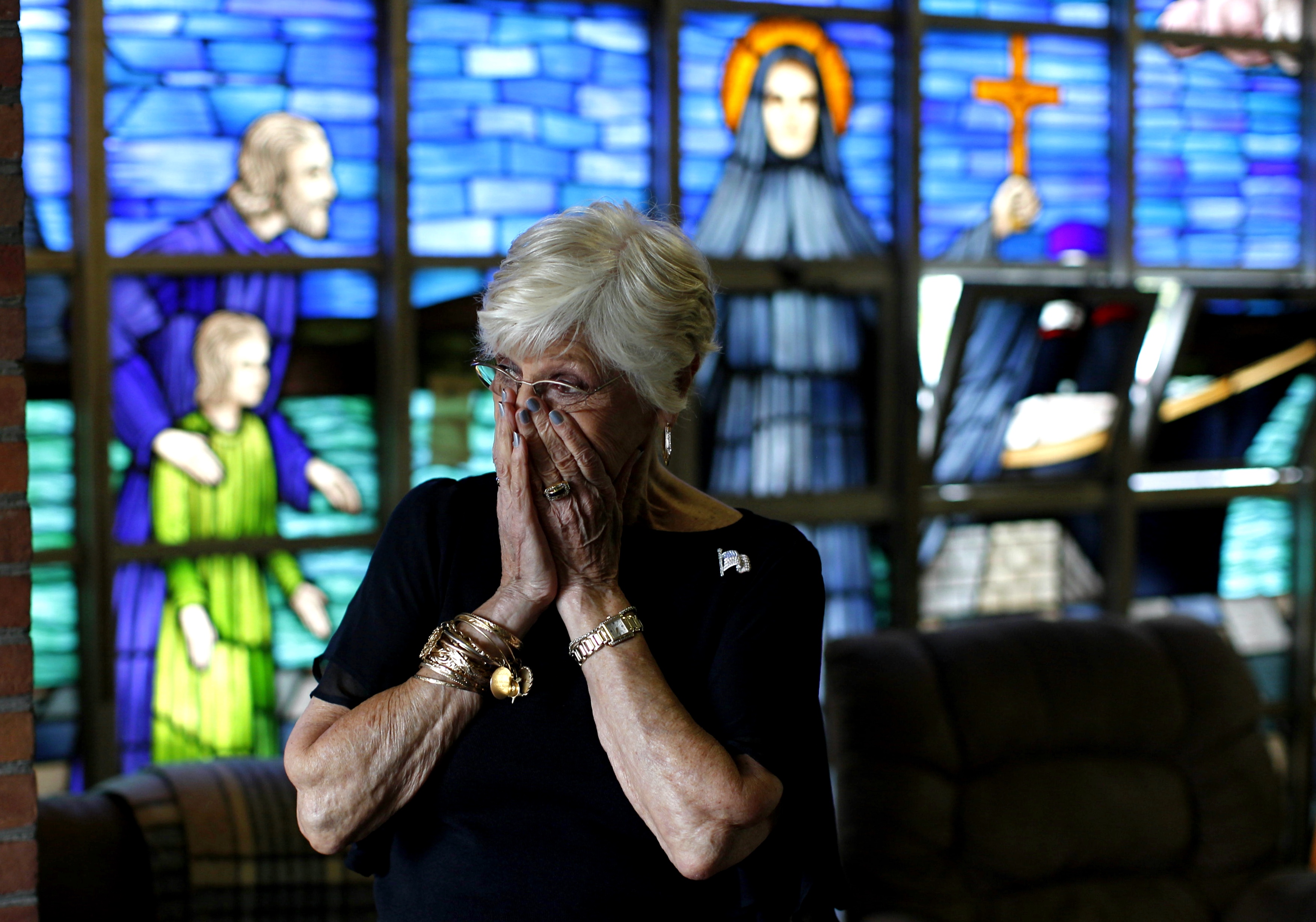 Parishioner Nancy Shilts became emotional before the final service was held Sunday at St. Frances X. Cabrini in Scituate.