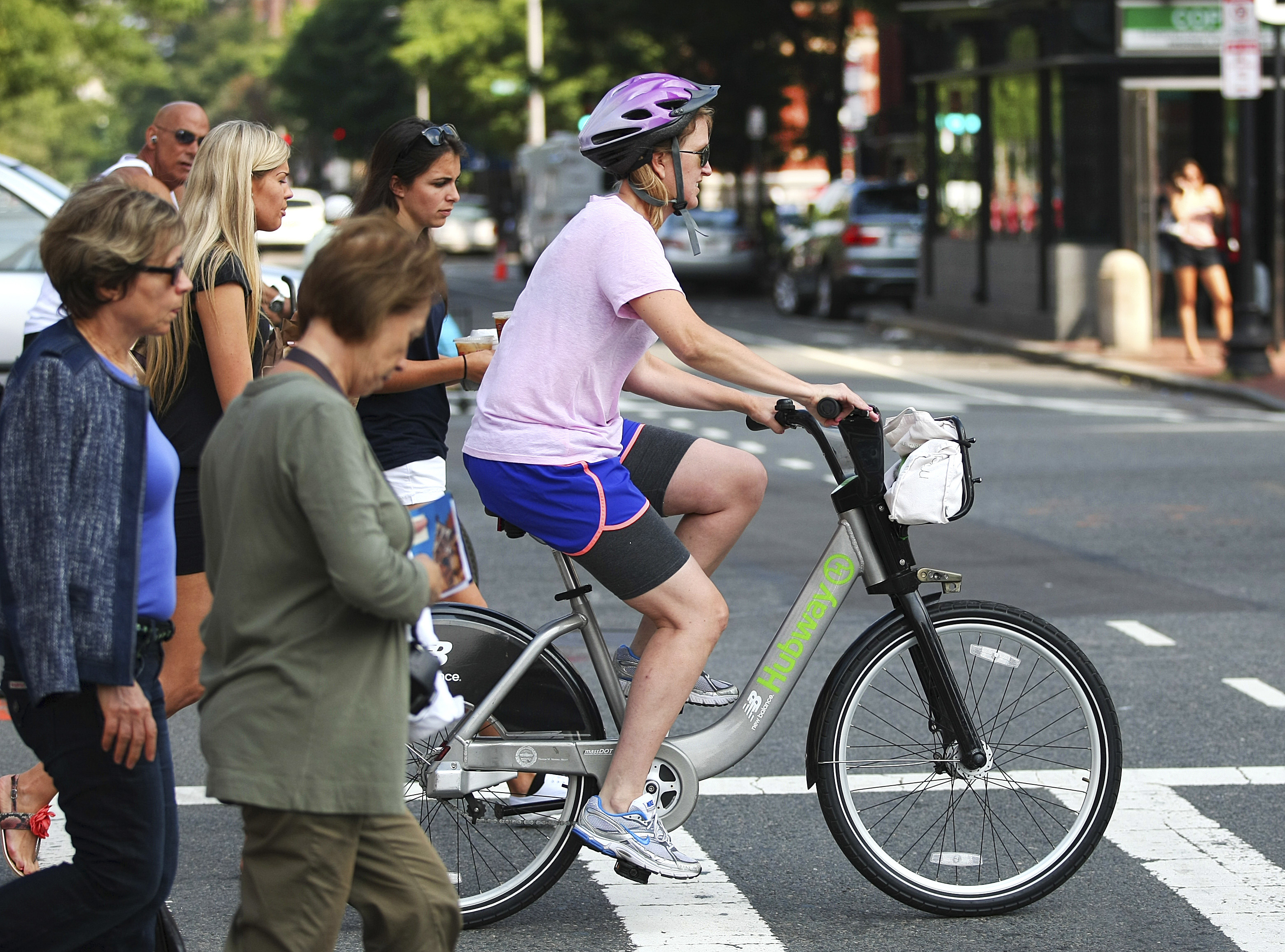 Jennifer Carp of the Back Bay rode a Hubway bicycle down Boylston Street. She picked up the bicycle at Copley Square.