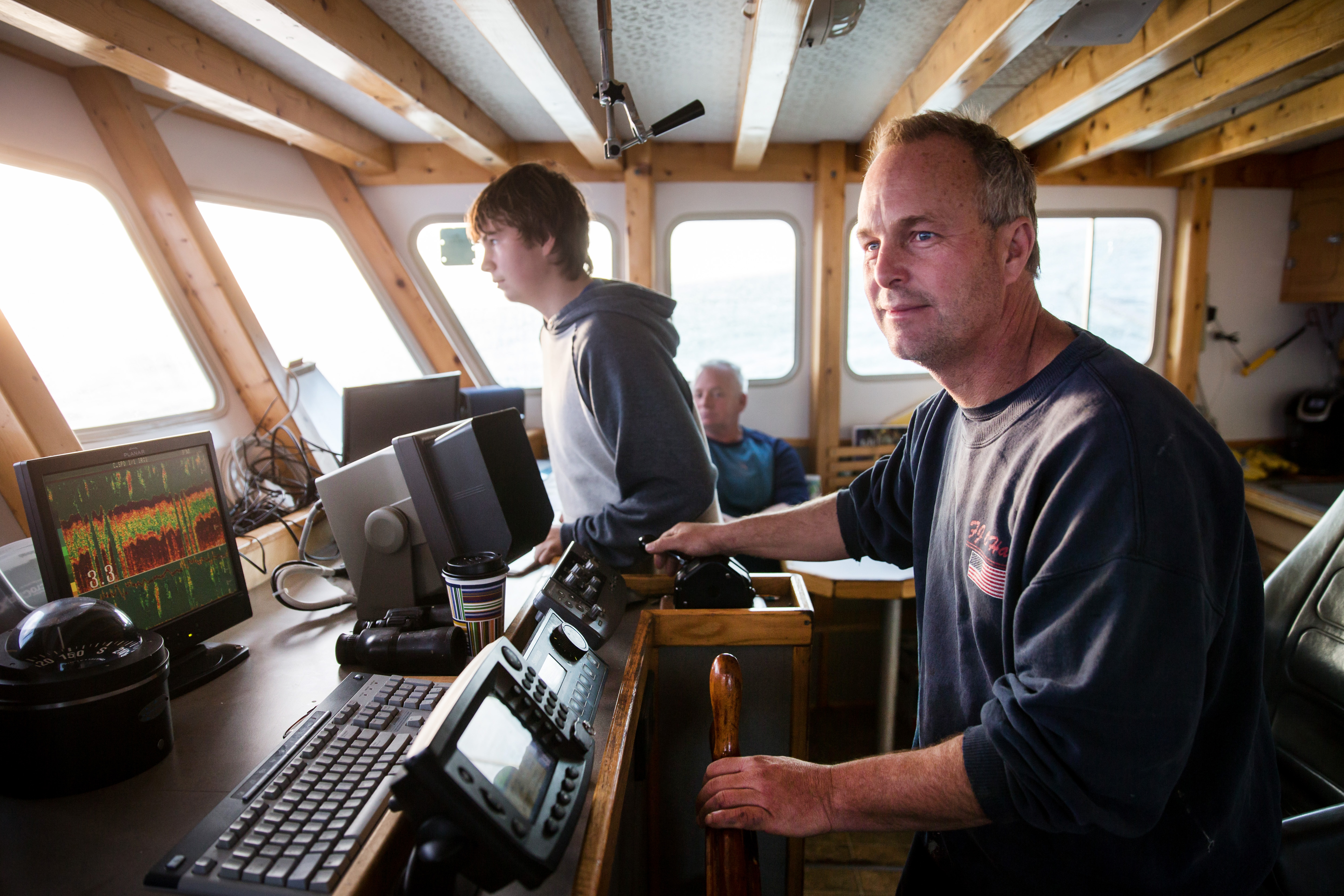 Sean Norton (left) and his father Kevin Norton piloted a vessell during a fishing trip off the coast of Scituate.