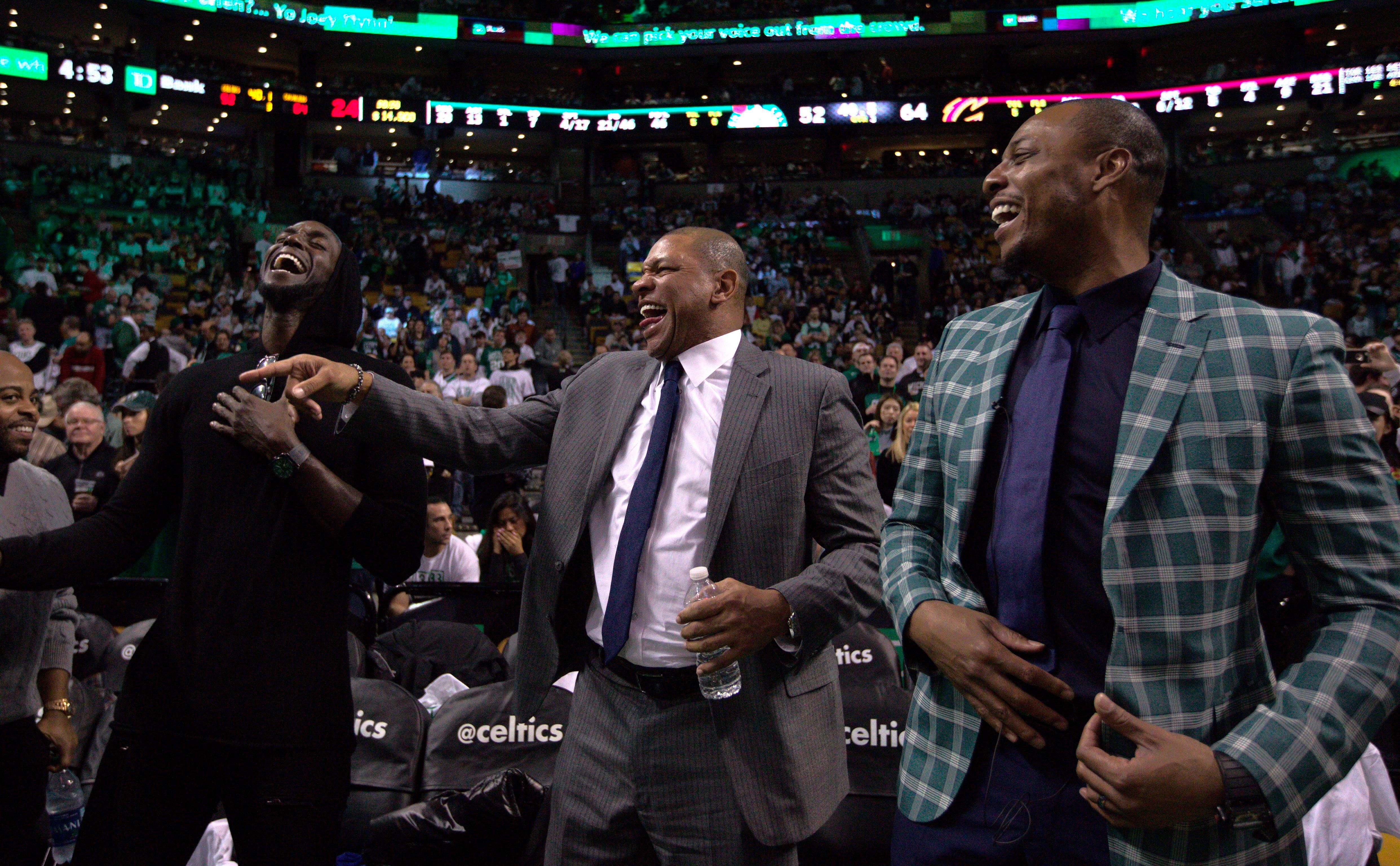 Doc Rivers shares a laugh with two of his former Celtics players: Kevin Garnett (left) and Paul Pierce (right).