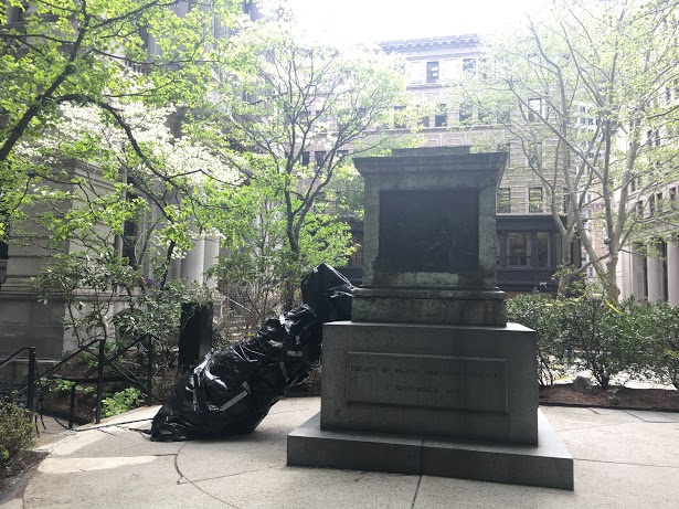 The statue was wrapped in a bag.