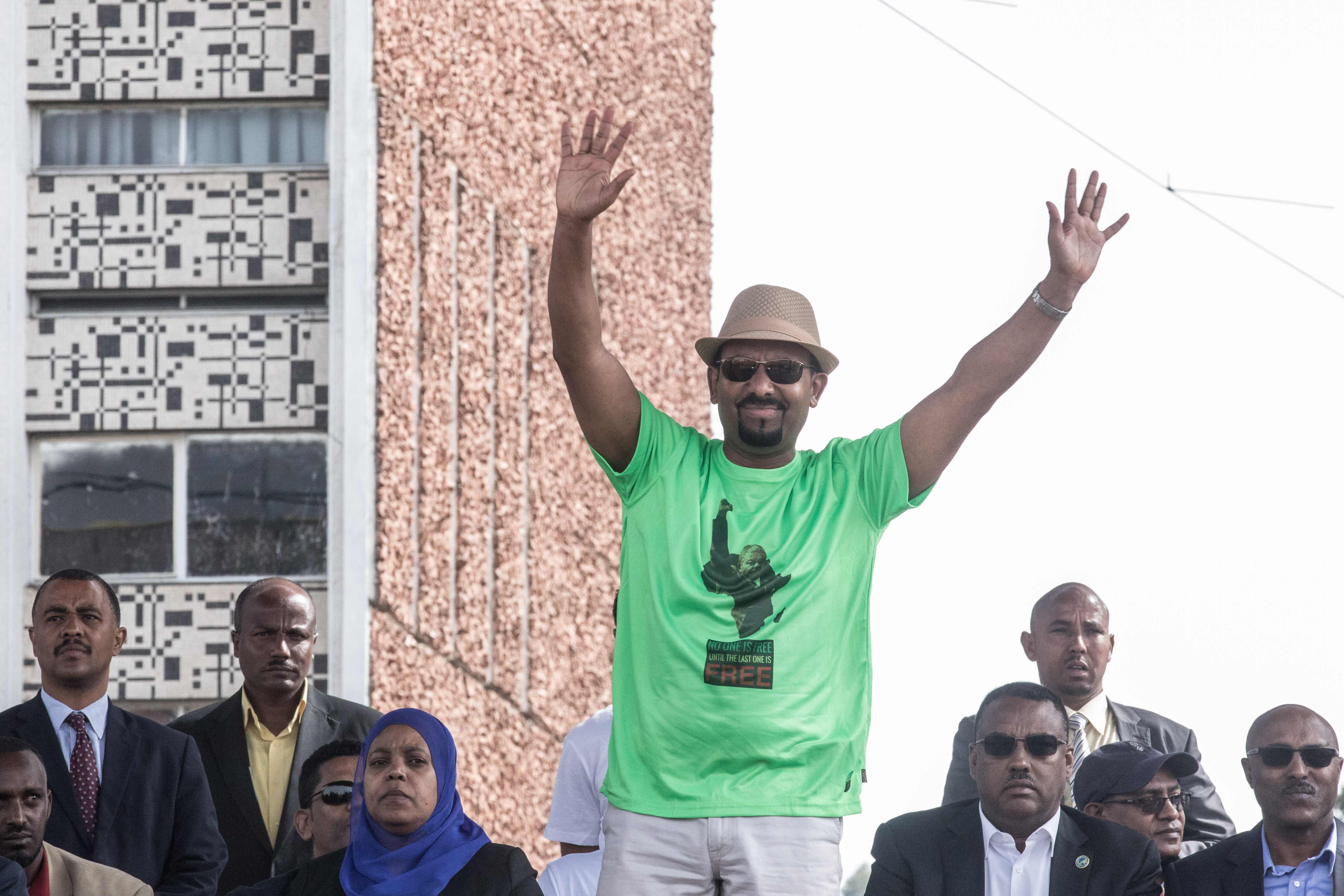 Prime Minister Abiy Ahmed of Ethiopia waves to the crowd during a rally in Addis Ababa on June 23, 2018.