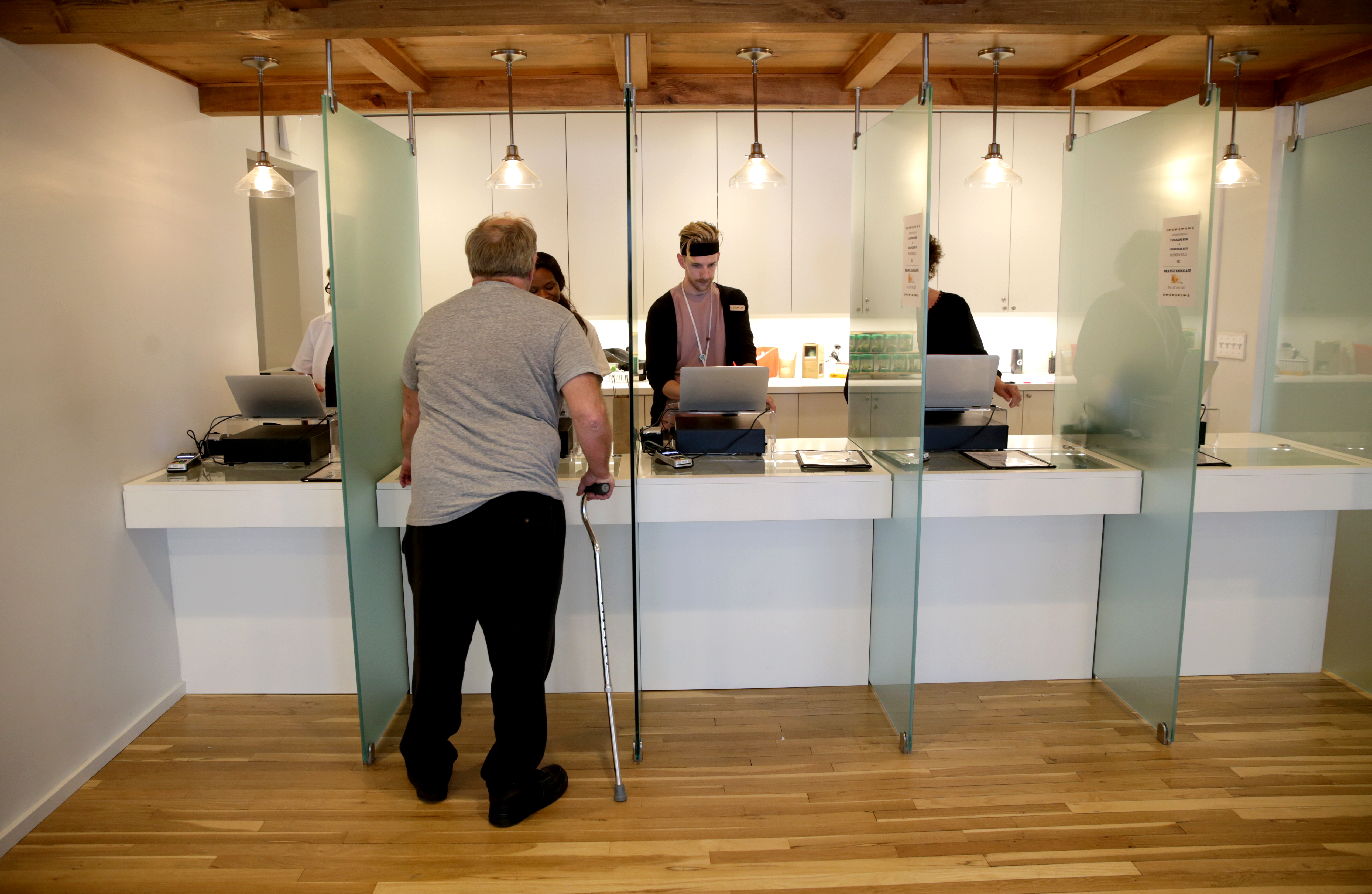 A patient waited at one of the care advocate stations at the Garden Remedies facility in Newton, which offered a variety of medical marijuana.