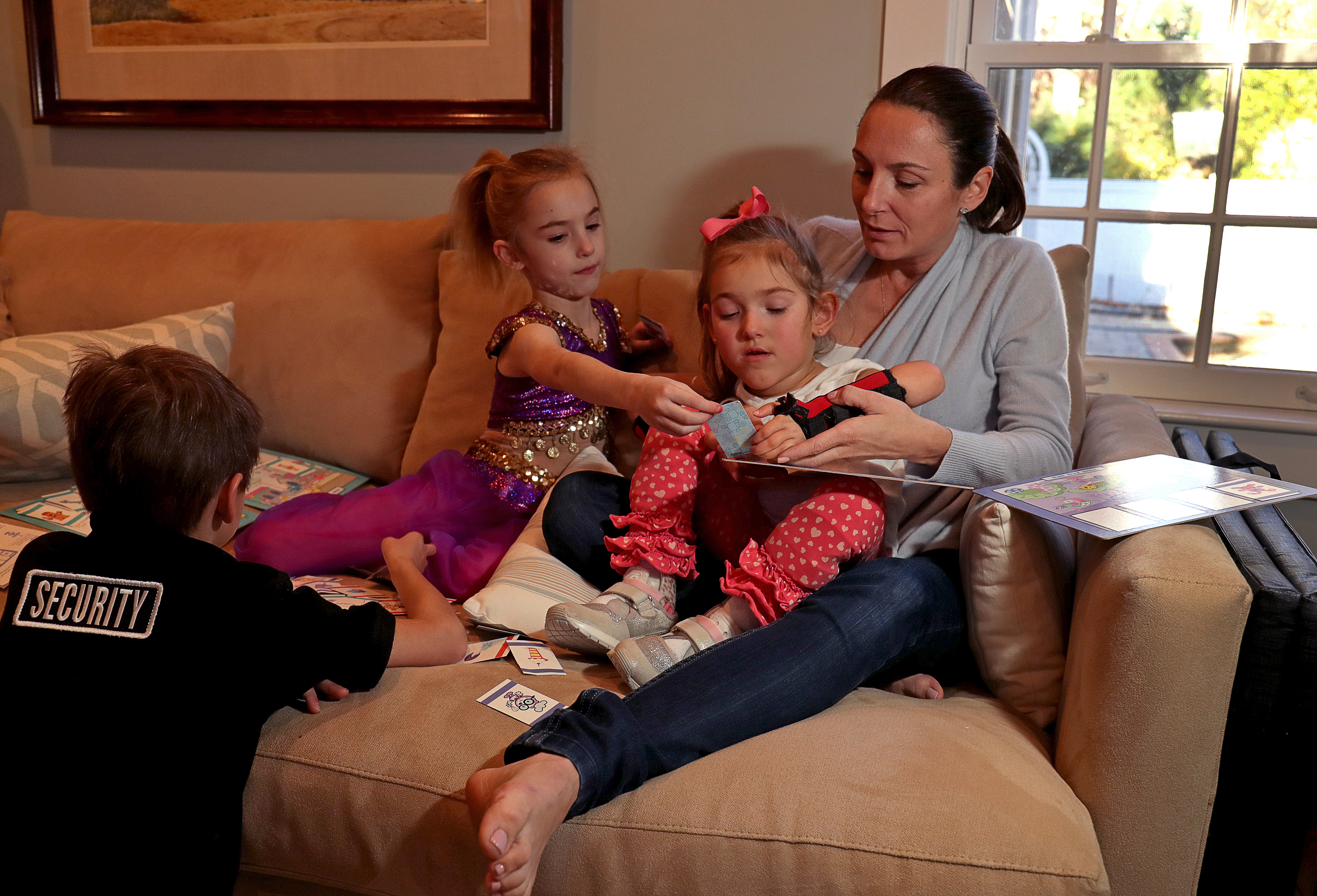 Dawn Oates played with her children, Harper, 5, and twins Olivia and Jack, 6. After she was denied admission to the Park School, Harper was accepted at another Brookline private school, Dexter Southfield, less than a mile away from the Park. The Oates family has pulled the twins out of the Park School.