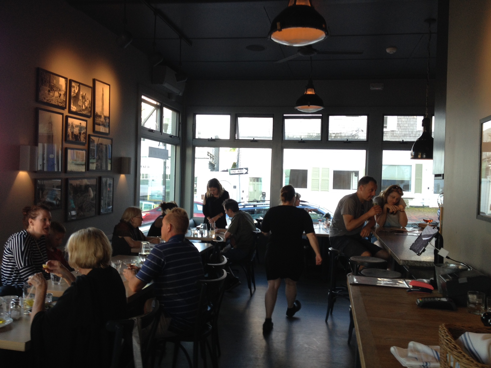 The dining area and bar at Feather & Wedge in Rockport.