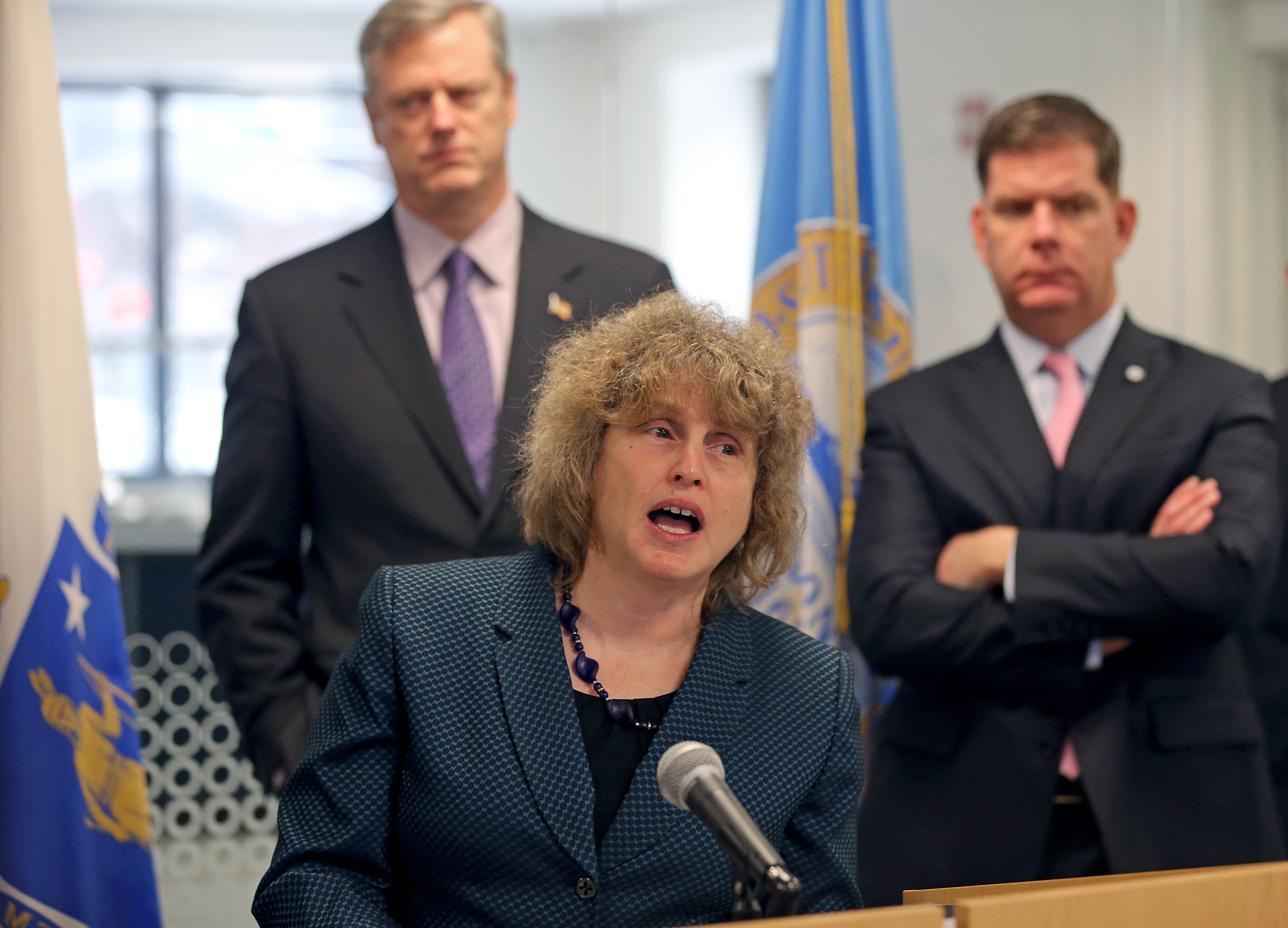 Secretary of Transportation Stephanie Pollack, with Governor Charlie Baker (left) and Boston Mayor Martin Walsh, behind her, discussed the plan at a news conference on Tuesday.