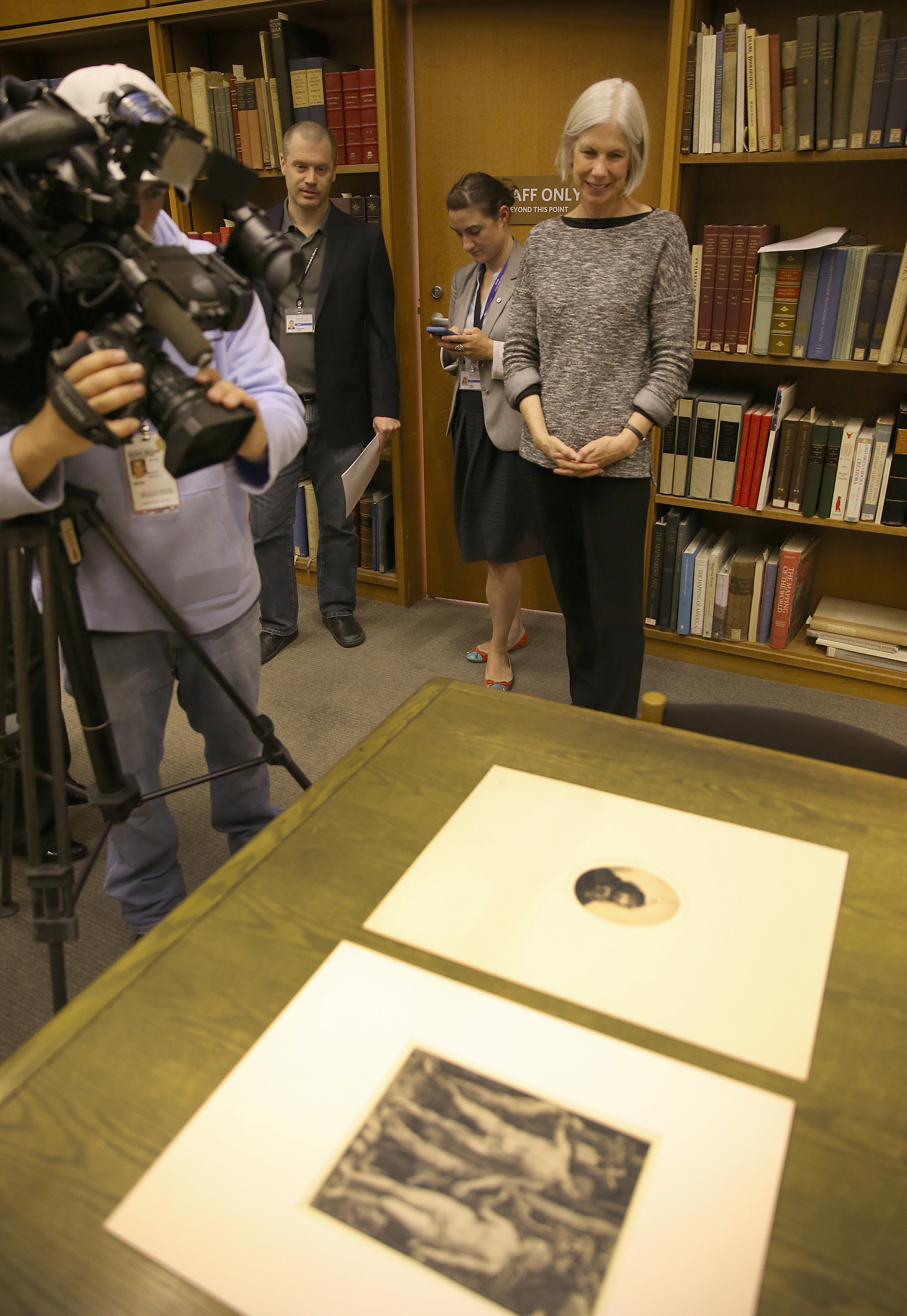 Amy Ryan with the two recently-found prints.