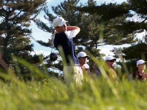St. John’s Matt Remley tees off on the first hole.